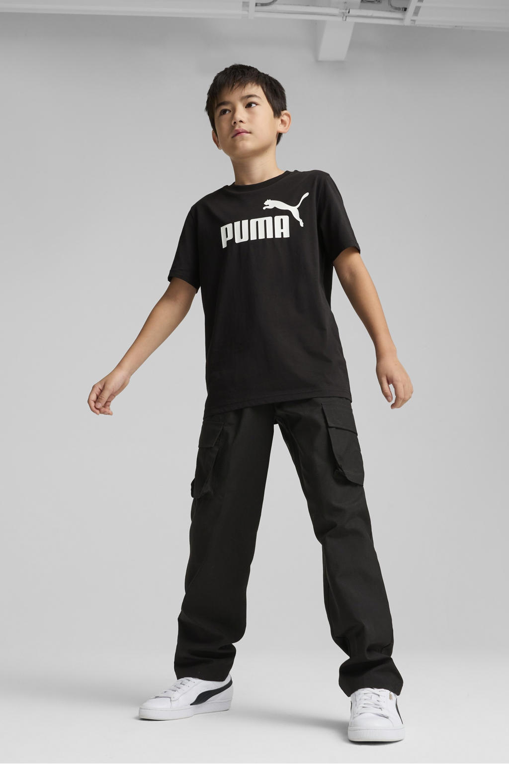 Zwarte jongens en meisjes Puma T-shirt van katoen met logo dessin, korte mouwen en ronde hals