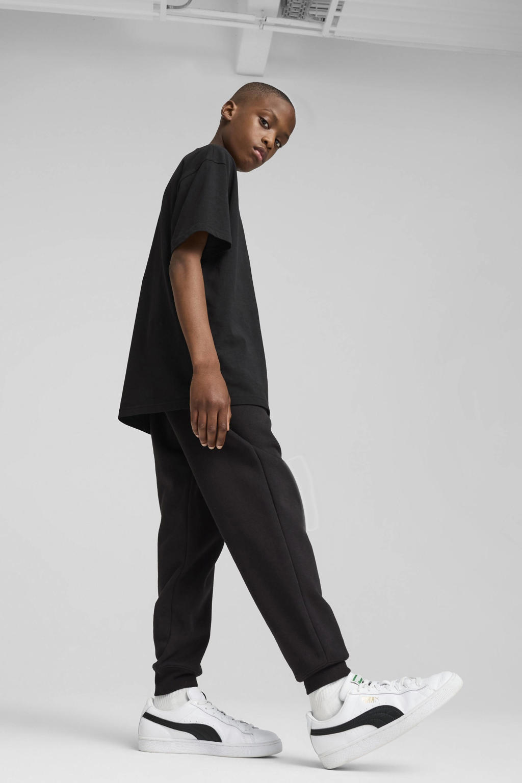 Zwarte jongens en meisjes Puma joggingbroek van katoen met elastische tailleband en effen