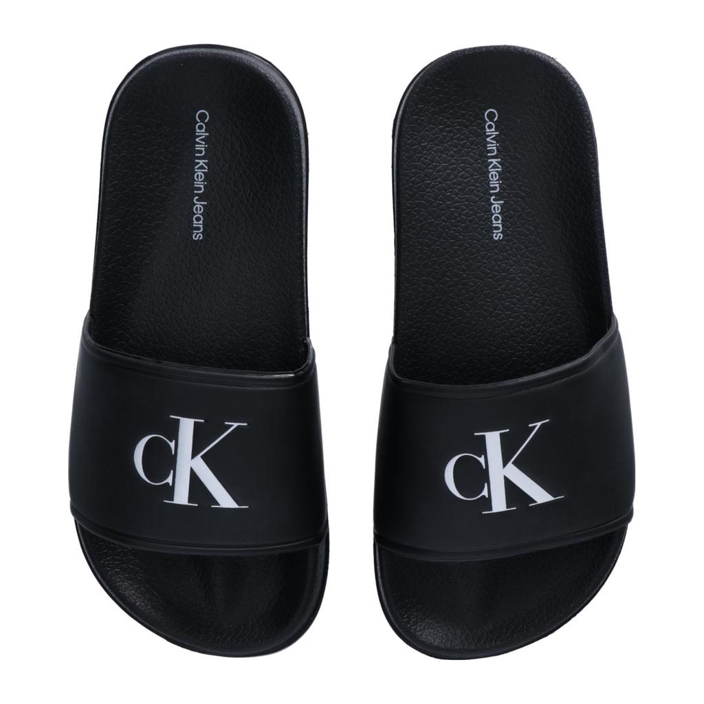 Zwarte jongens en meisjes Calvin Klein Freddie badslippers van imitatieleer