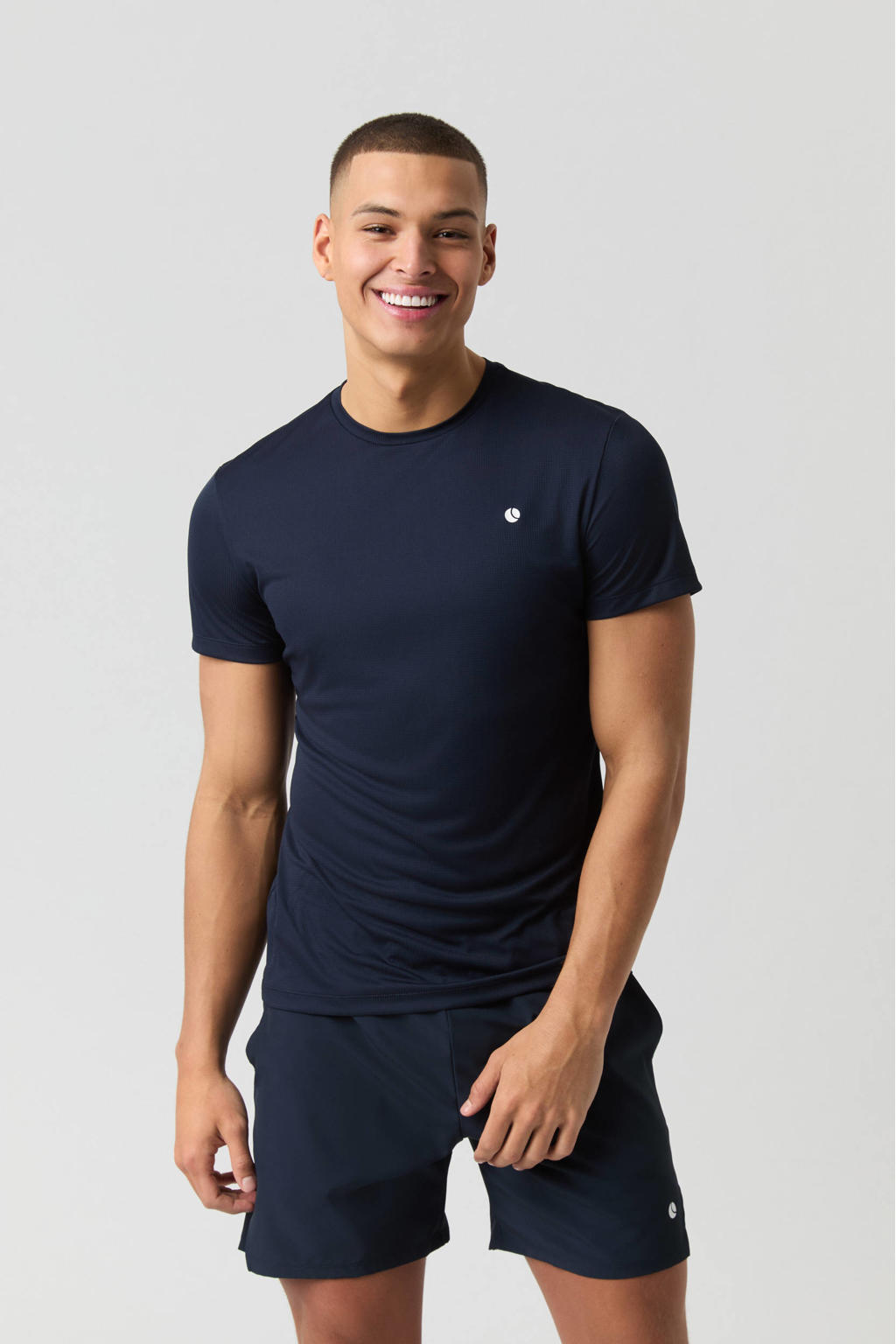 Donkerblauwe heren Björn Borg sportshirt Ace Light van polyester met logo dessin, korte mouwen en ronde hals