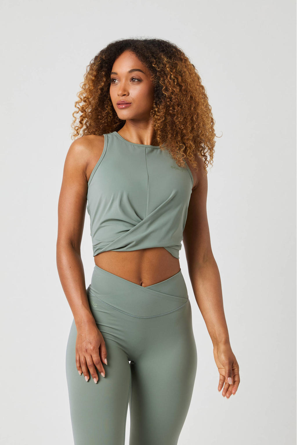 Lichtgroene dames Björn Borg level 1 sporttop Studio Cross van polyamide met effen