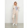 &Co Woman travelstof straight leg broek - crème