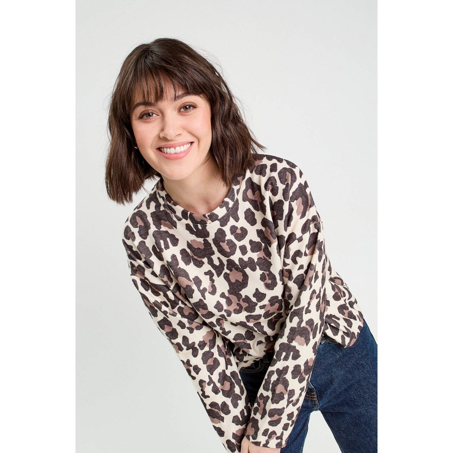 Cache sweater bruin