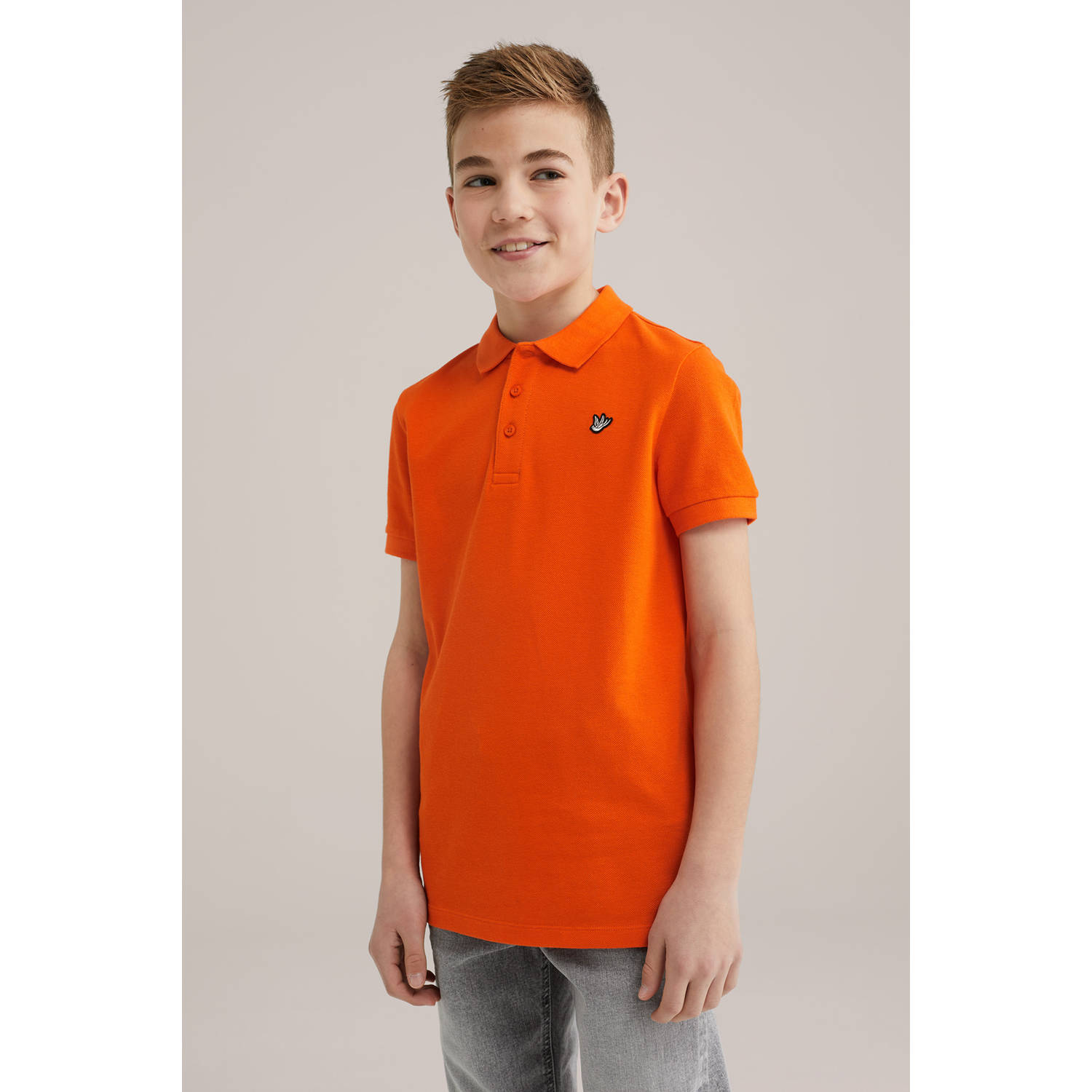 WE Fashion polo oranje