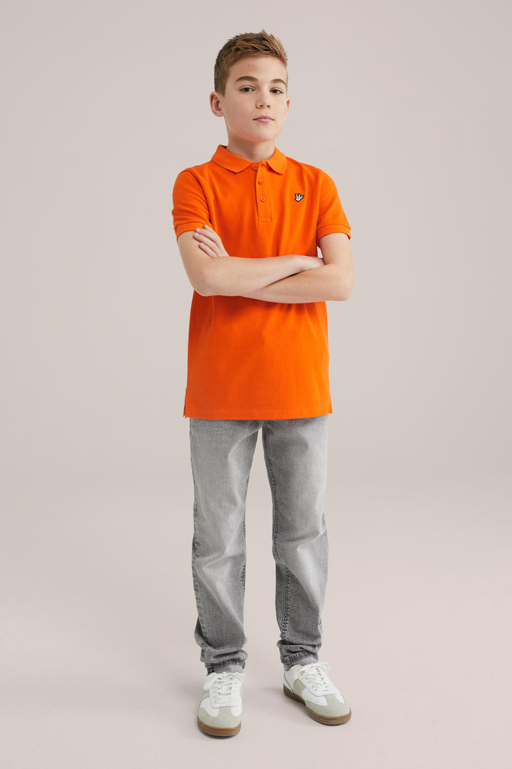 Oranje jongens WE Fashion polo van katoen met effen, korte mouwen en knoopsluiting
