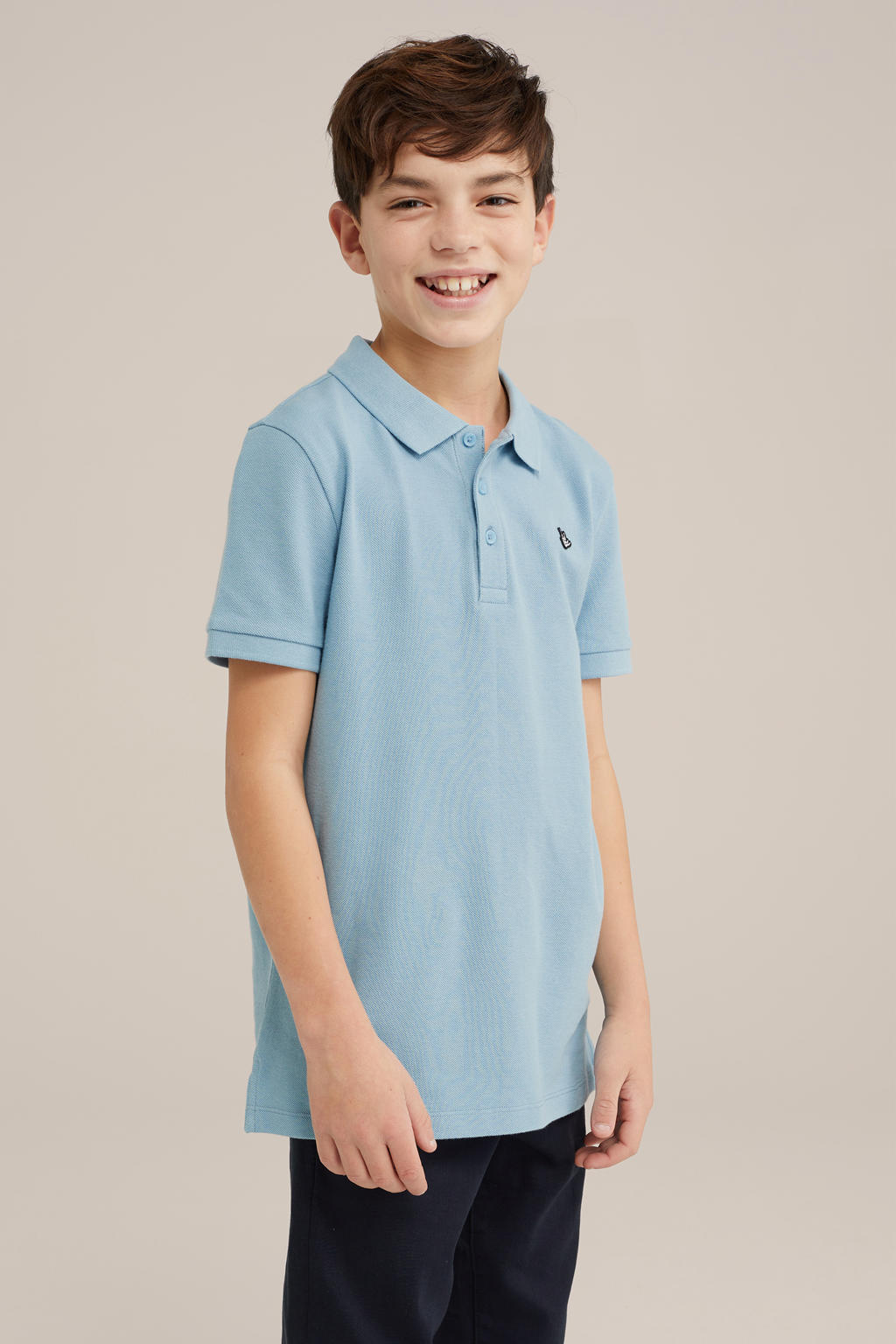 Blauwe jongens WE Fashion polo ijsblauw van katoen met effen, korte mouwen en knoopsluiting