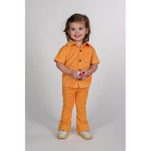 The New Chapter polo oranje afbeelding