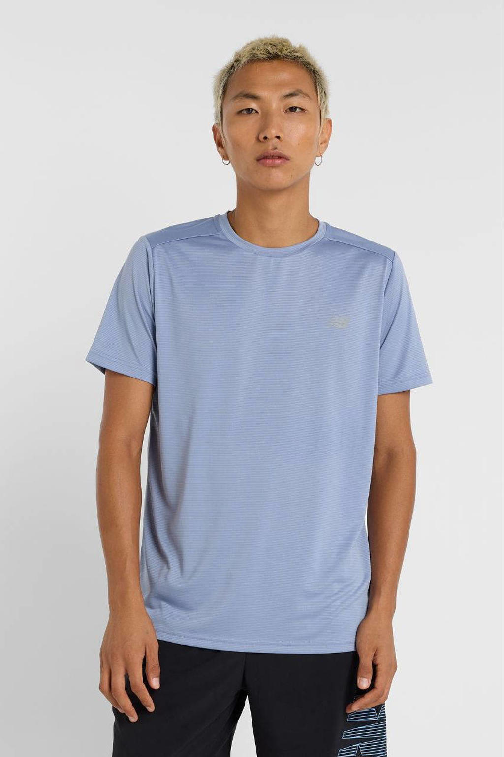 Lichtblauwe heren New Balance sportshirt van polyester met effen, korte mouwen en ronde hals