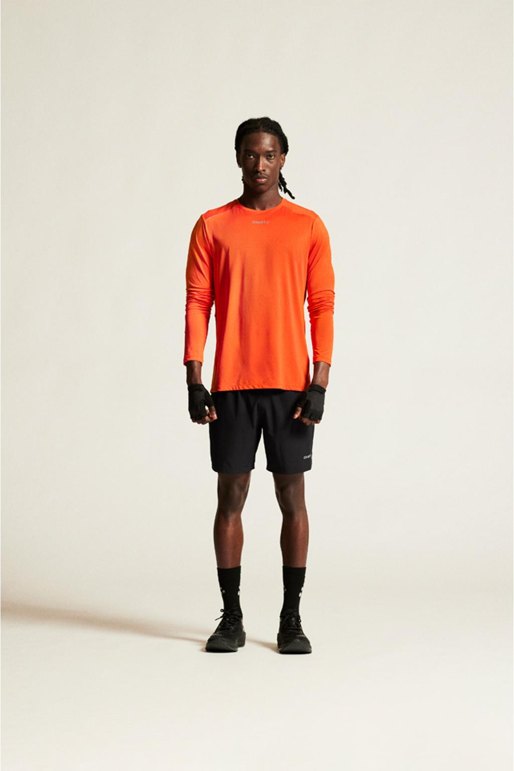 Oranje heren Craft Essence sportshirt van polyester met lange mouwen en ronde hals
