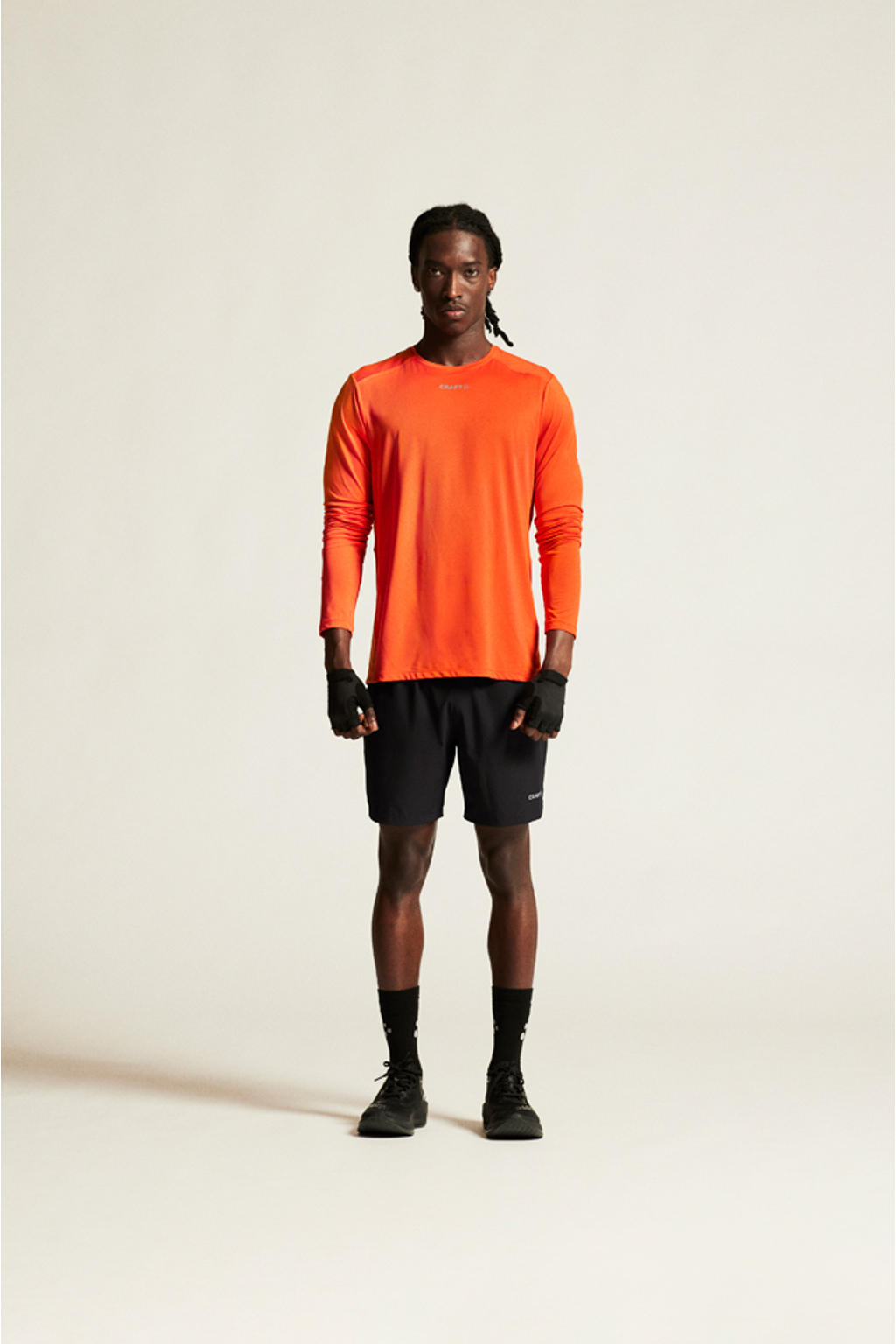 Oranje heren Craft Essence sportshirt van polyester met lange mouwen en ronde hals
