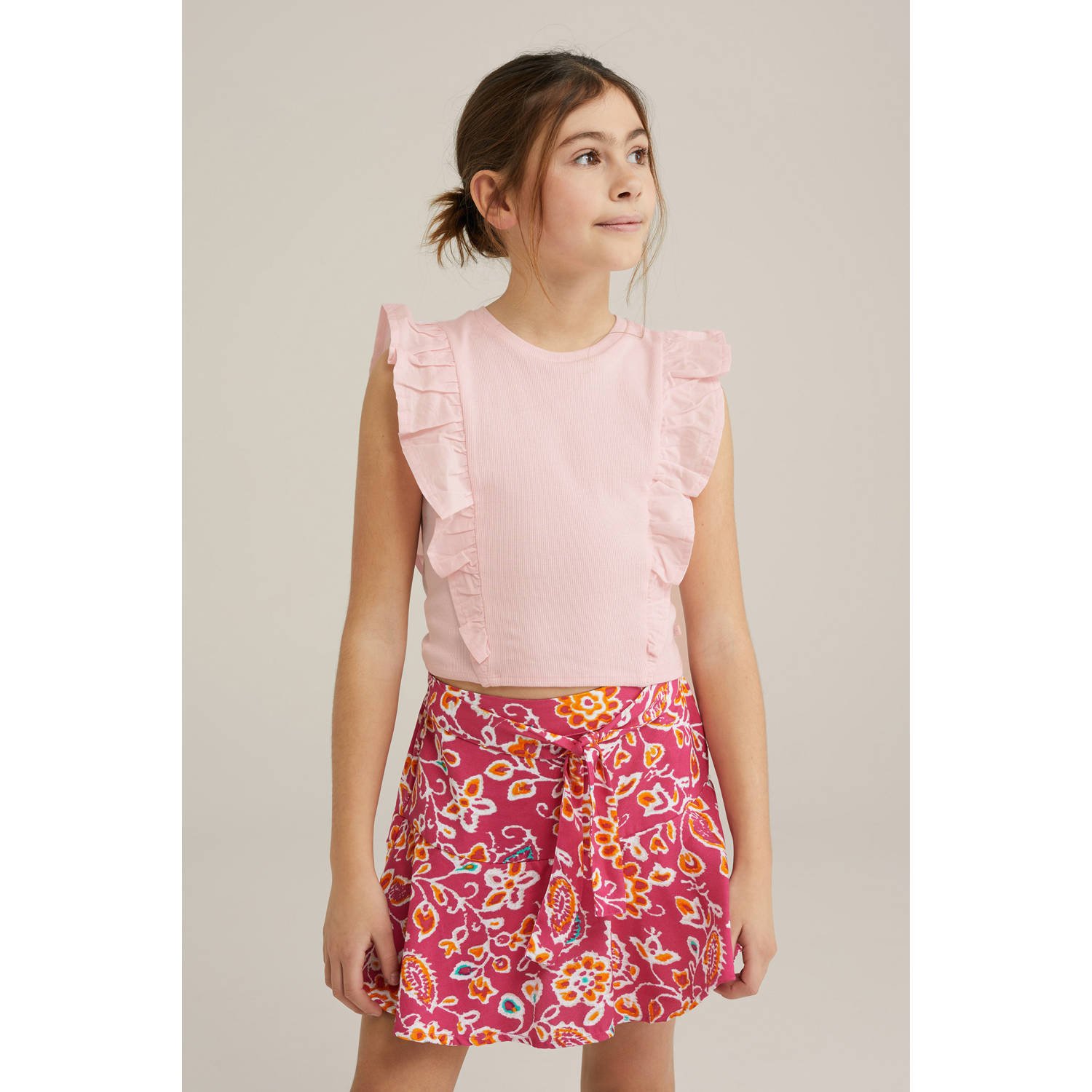 WE Fashion mouwloze top lichtroze rib gebreid