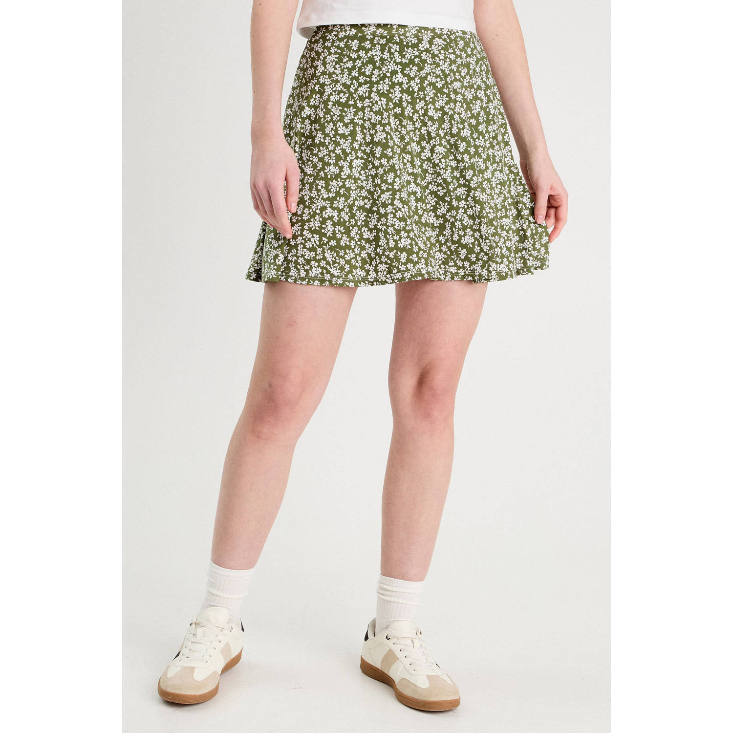 Cache mini rok kaki