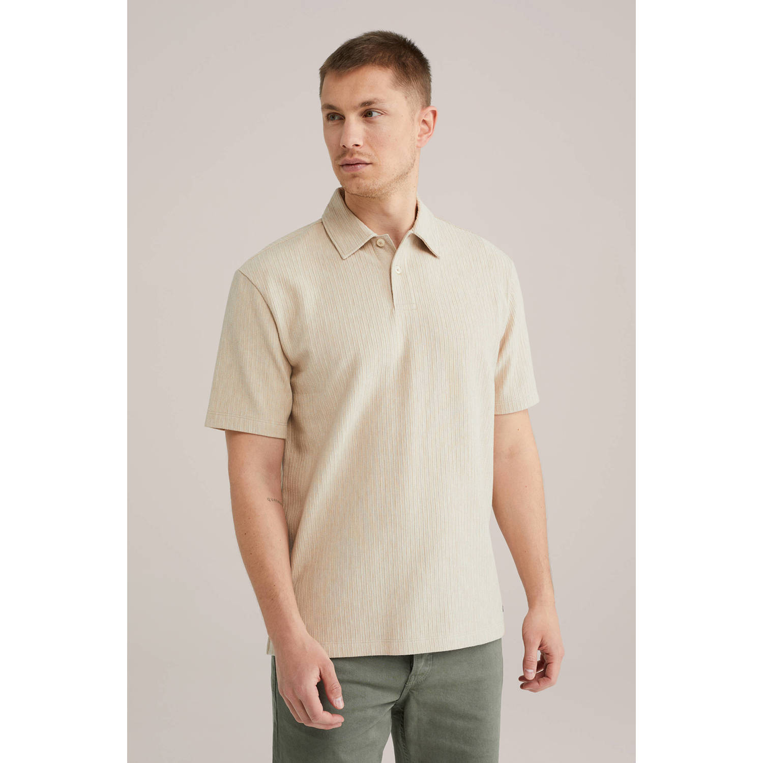 WE Fashion relaxed polo met ingebreid patroon beige