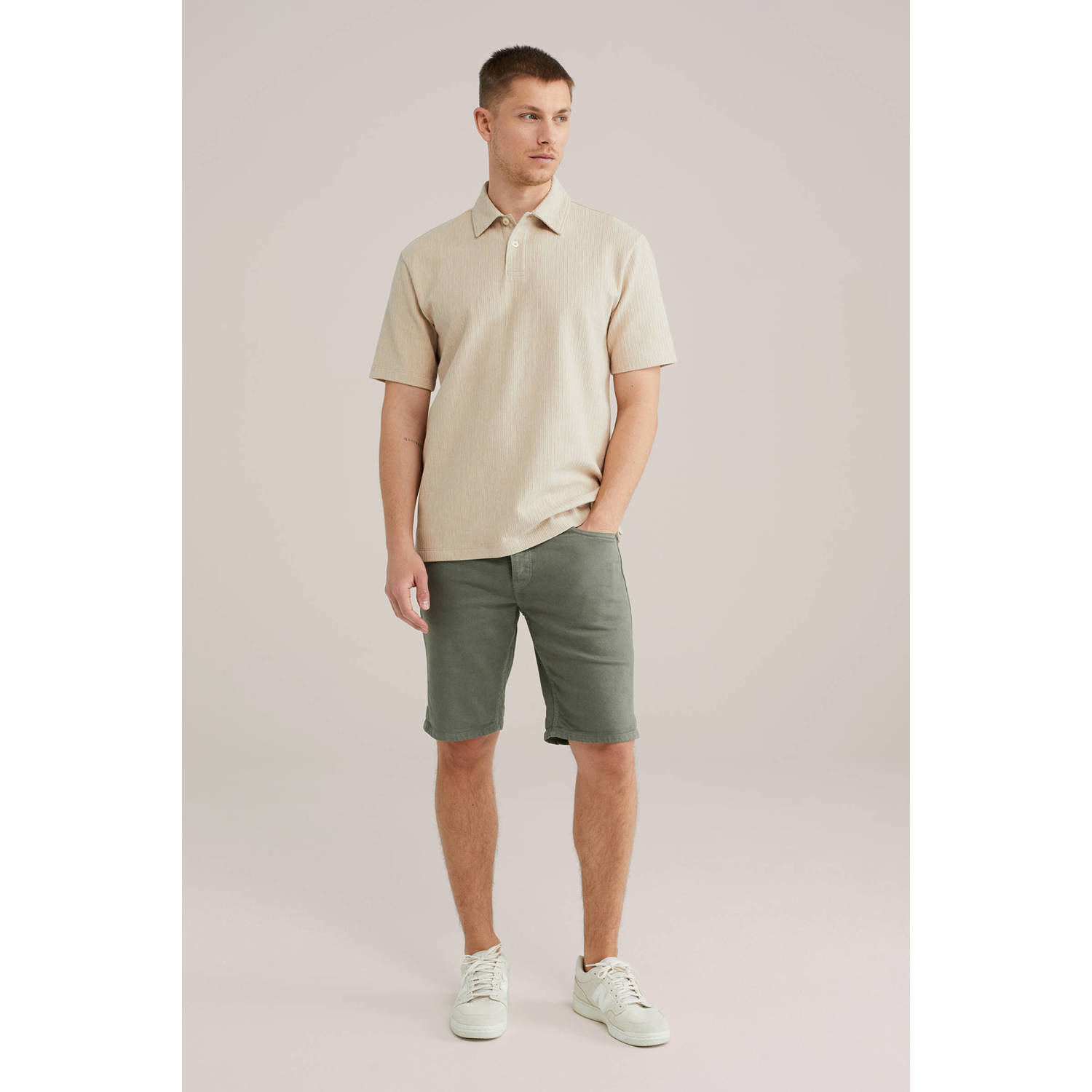 WE Fashion relaxed polo met ingebreid patroon beige