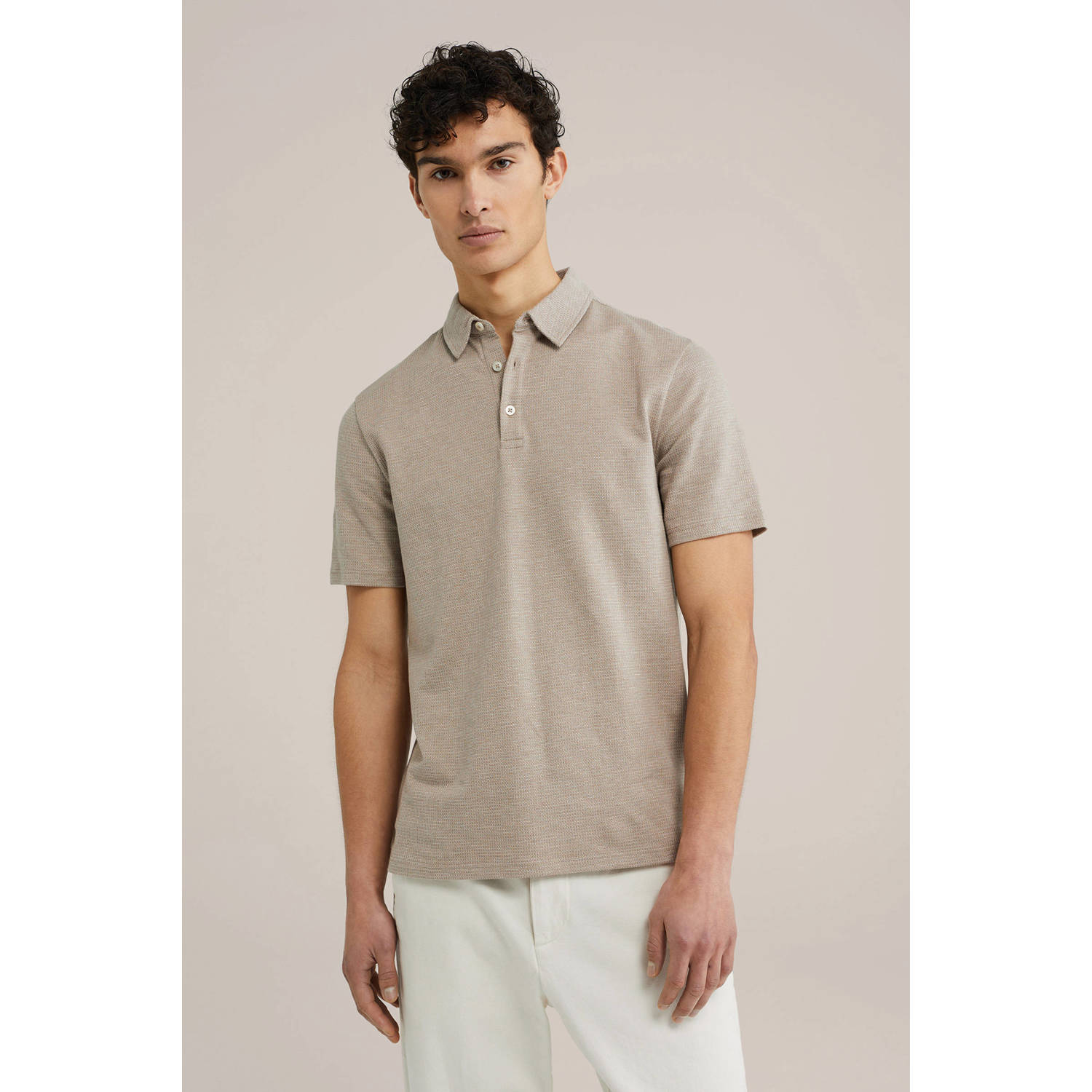 WE Fashion slim polo met textuur beige