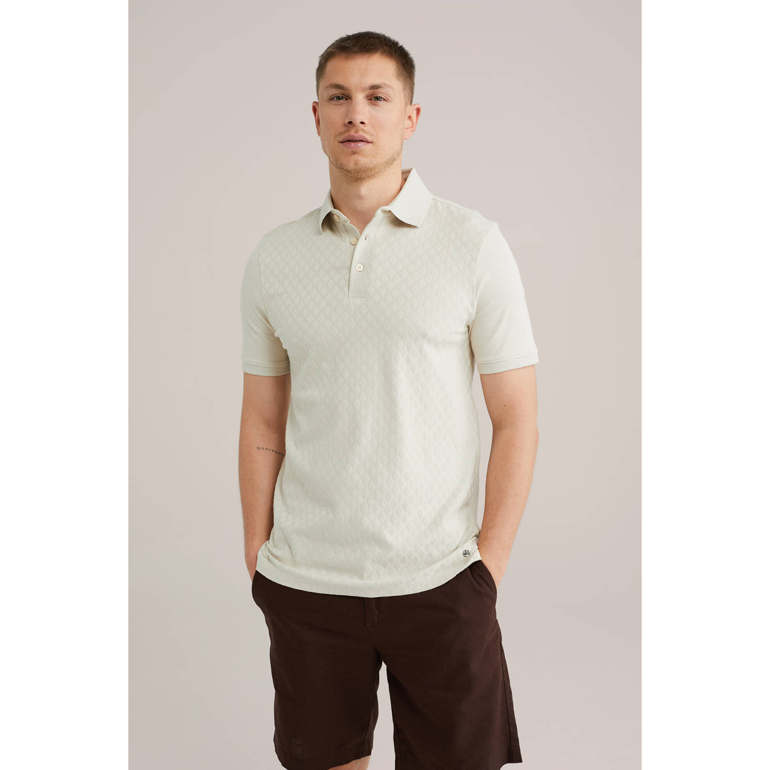 WE Fashion slim polo met ingebreid patroon beige