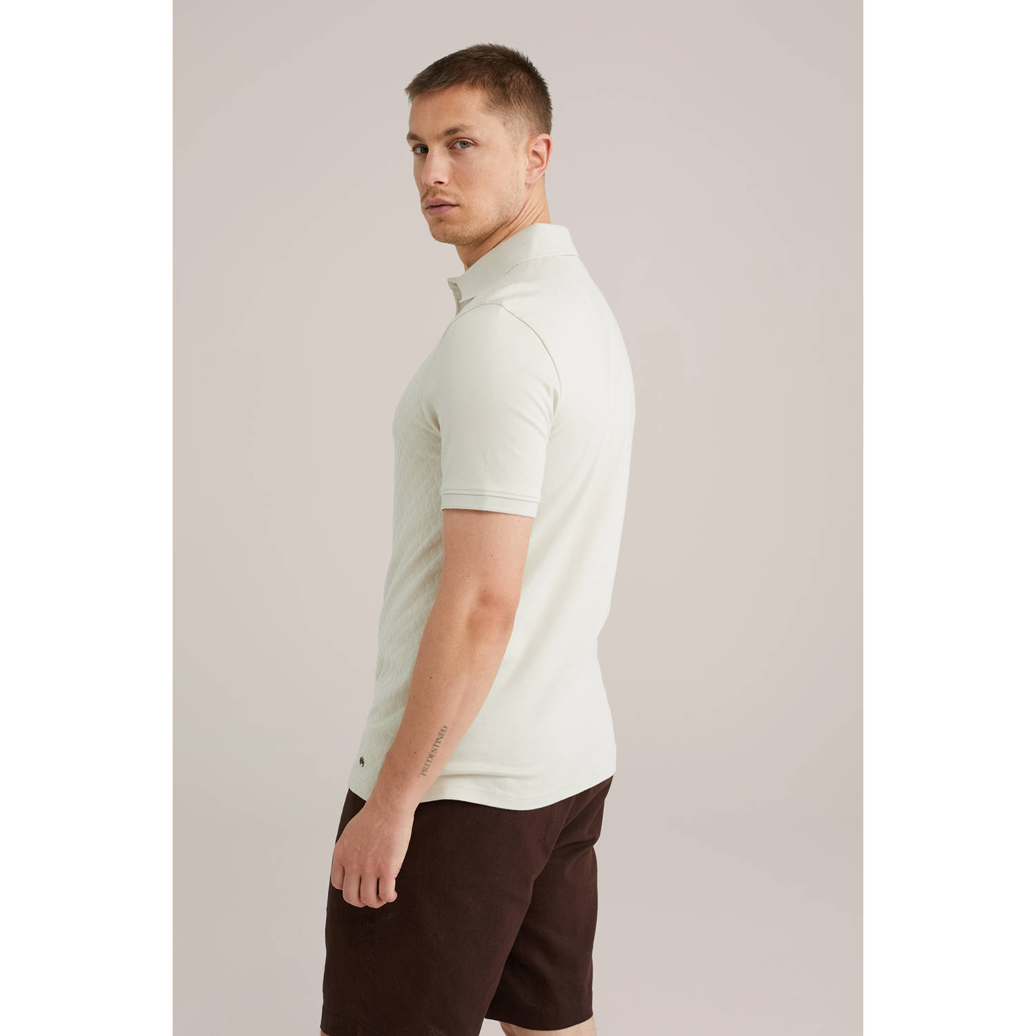 WE Fashion slim polo met ingebreid patroon beige