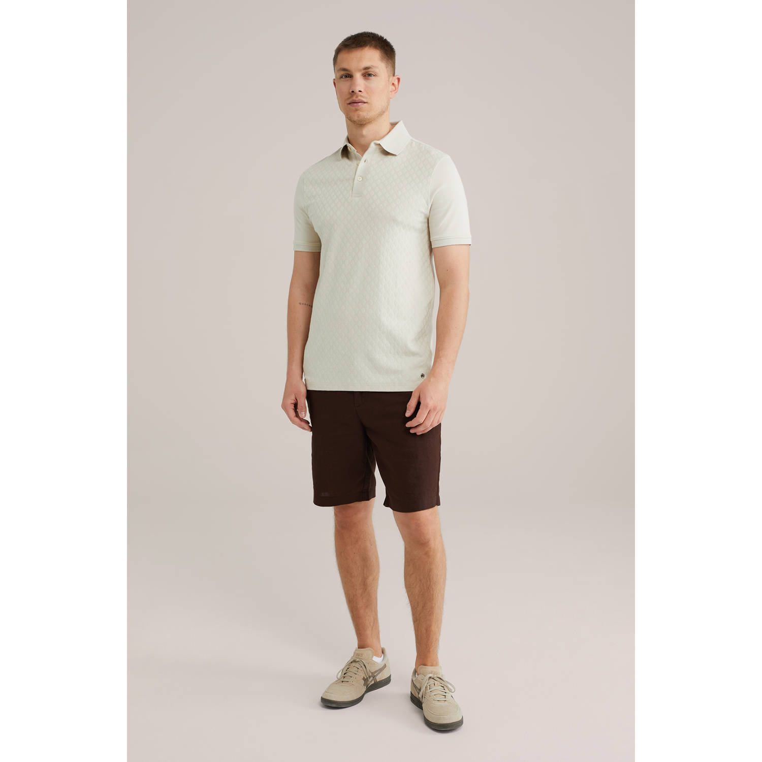 WE Fashion slim polo met ingebreid patroon beige