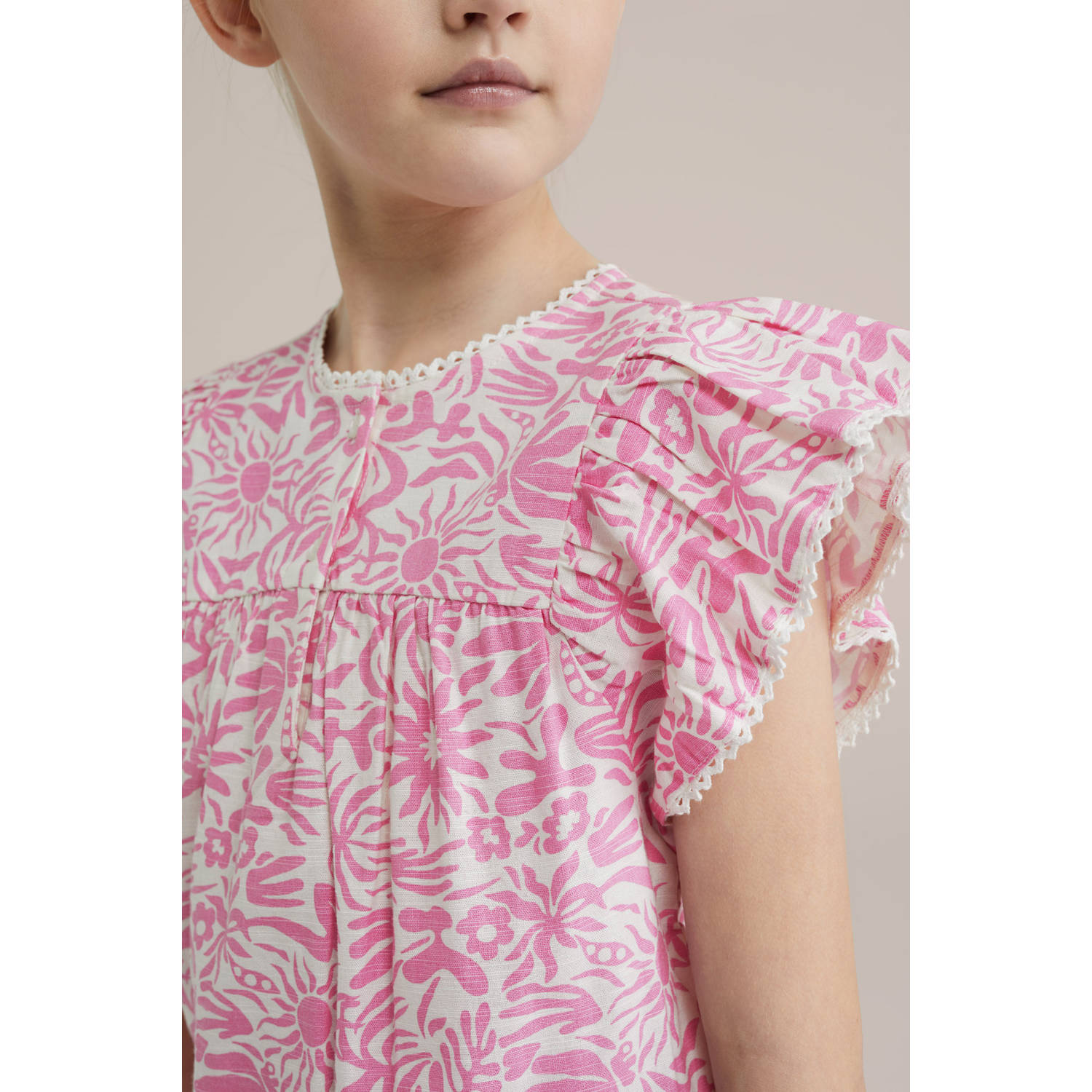 WE Fashion mouwloze top lichtroze wit broderie