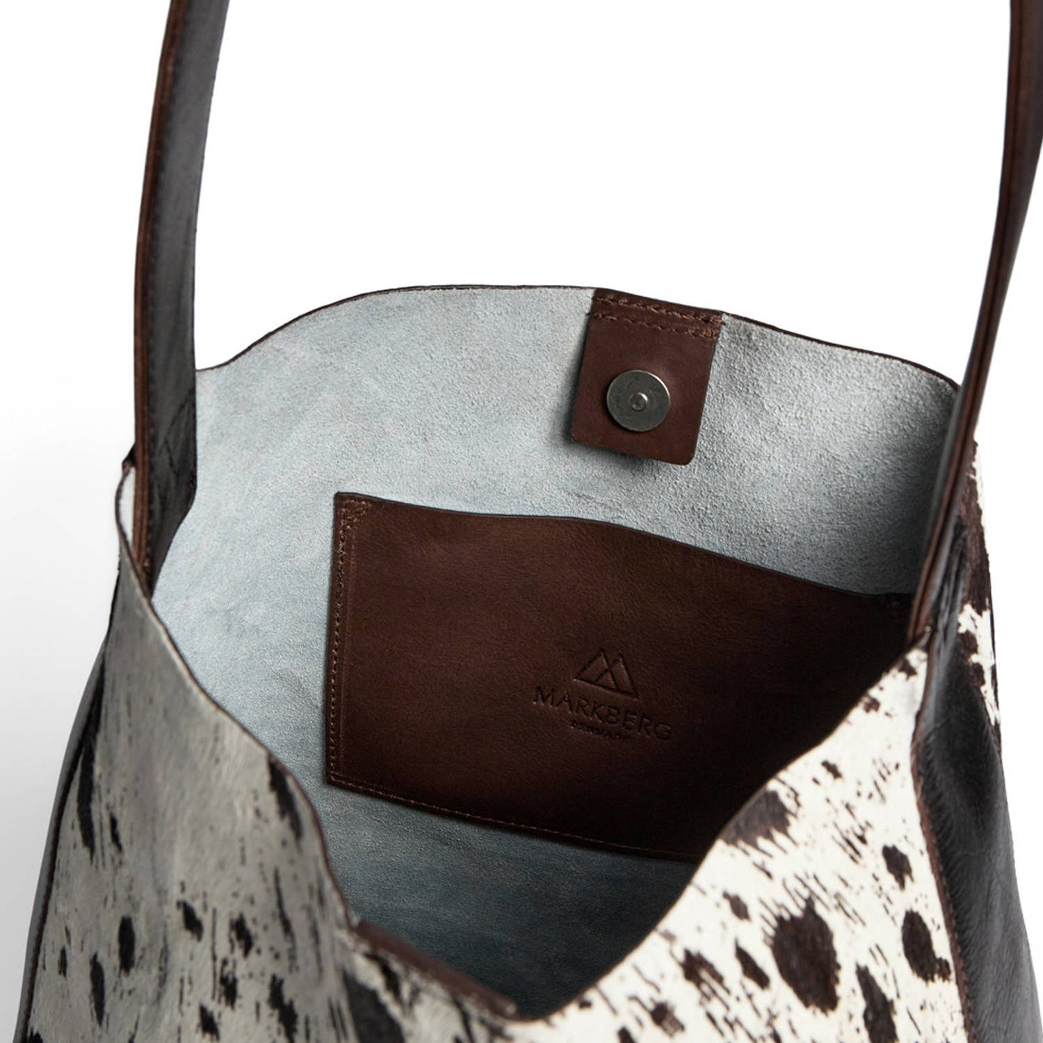 Markberg leren schoudertas met koeienprint Shelby bruin wit