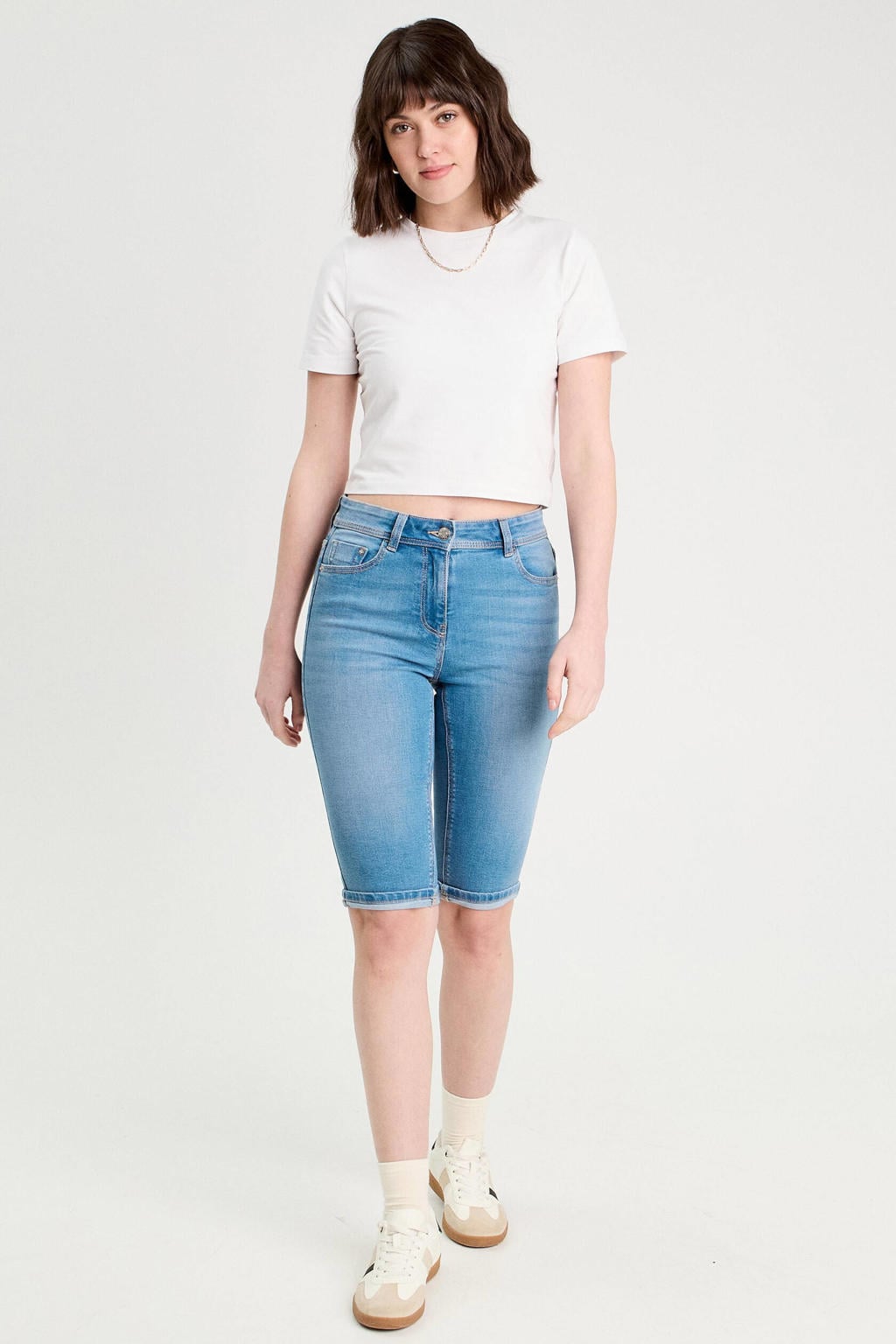 Medium blue denim dames Cache Cache slim regular waist short van denim met effen
