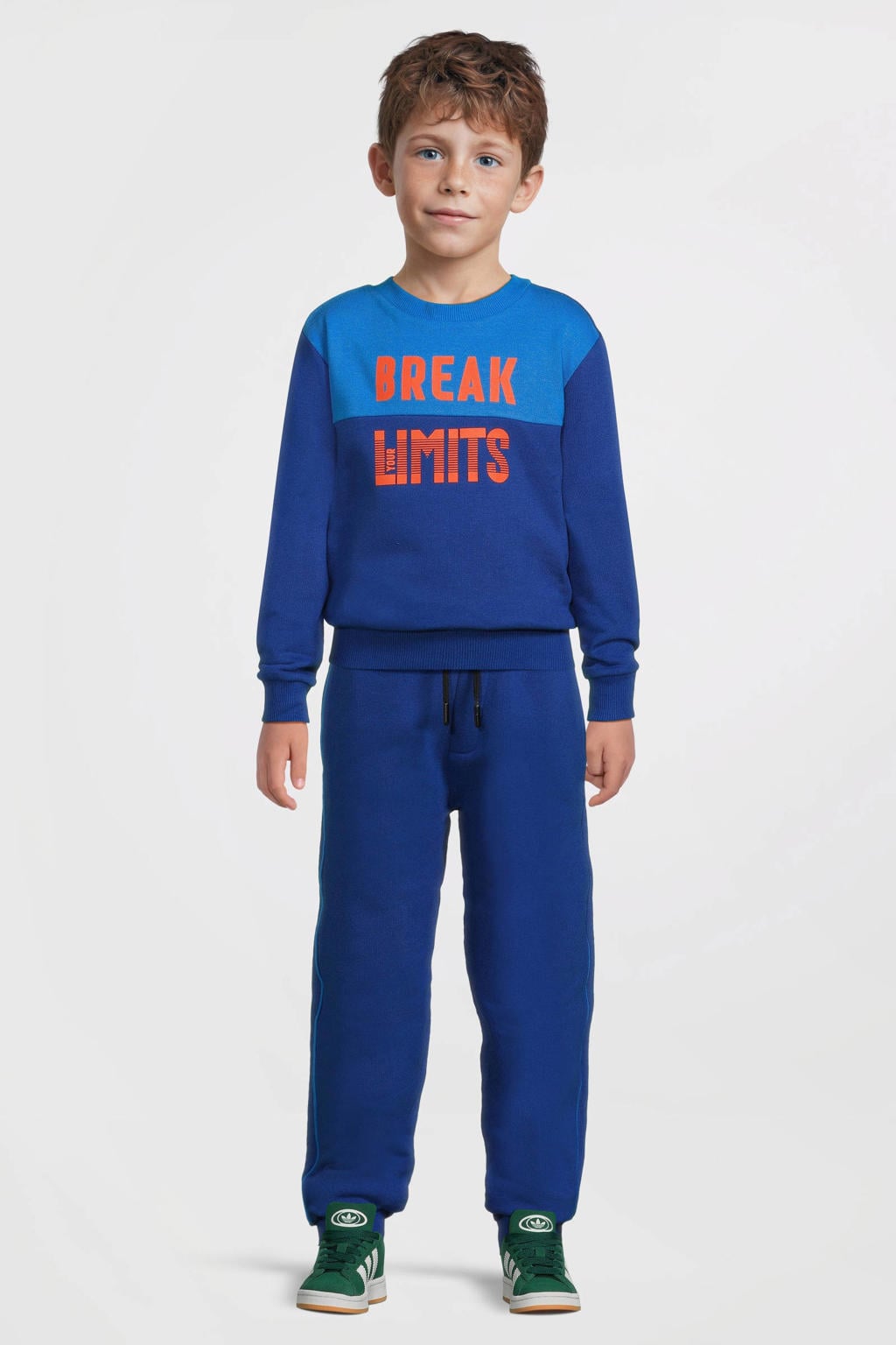 Donkerblauwe jongens Orange Stars fleece joggingbroek bies van sweat materiaal met elastische tailleband met koord en effen