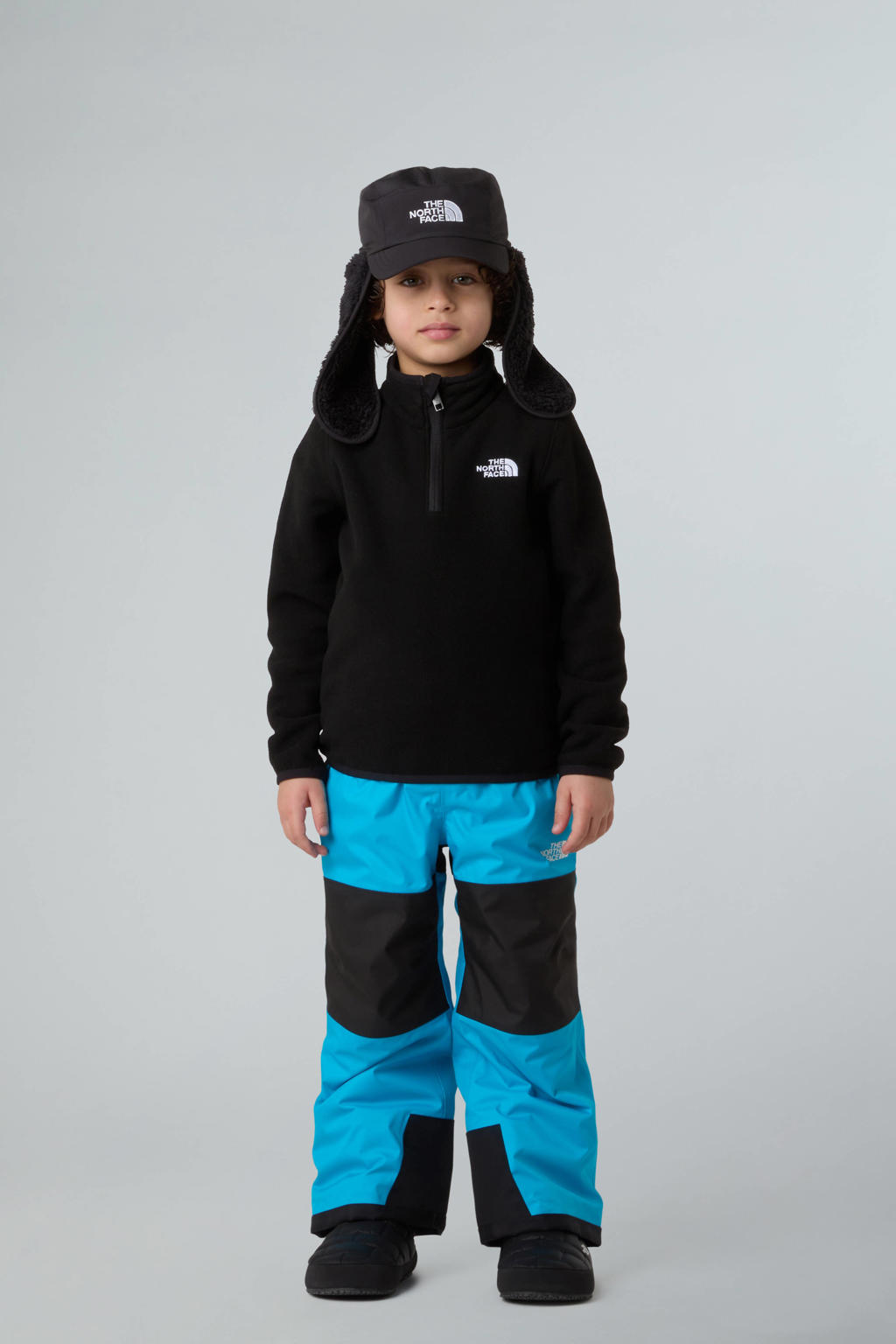 Zwarte jongens en meisjes The North Face fleece sweater Glacier met effen, lange mouwen, opstaande kraag en halve rits