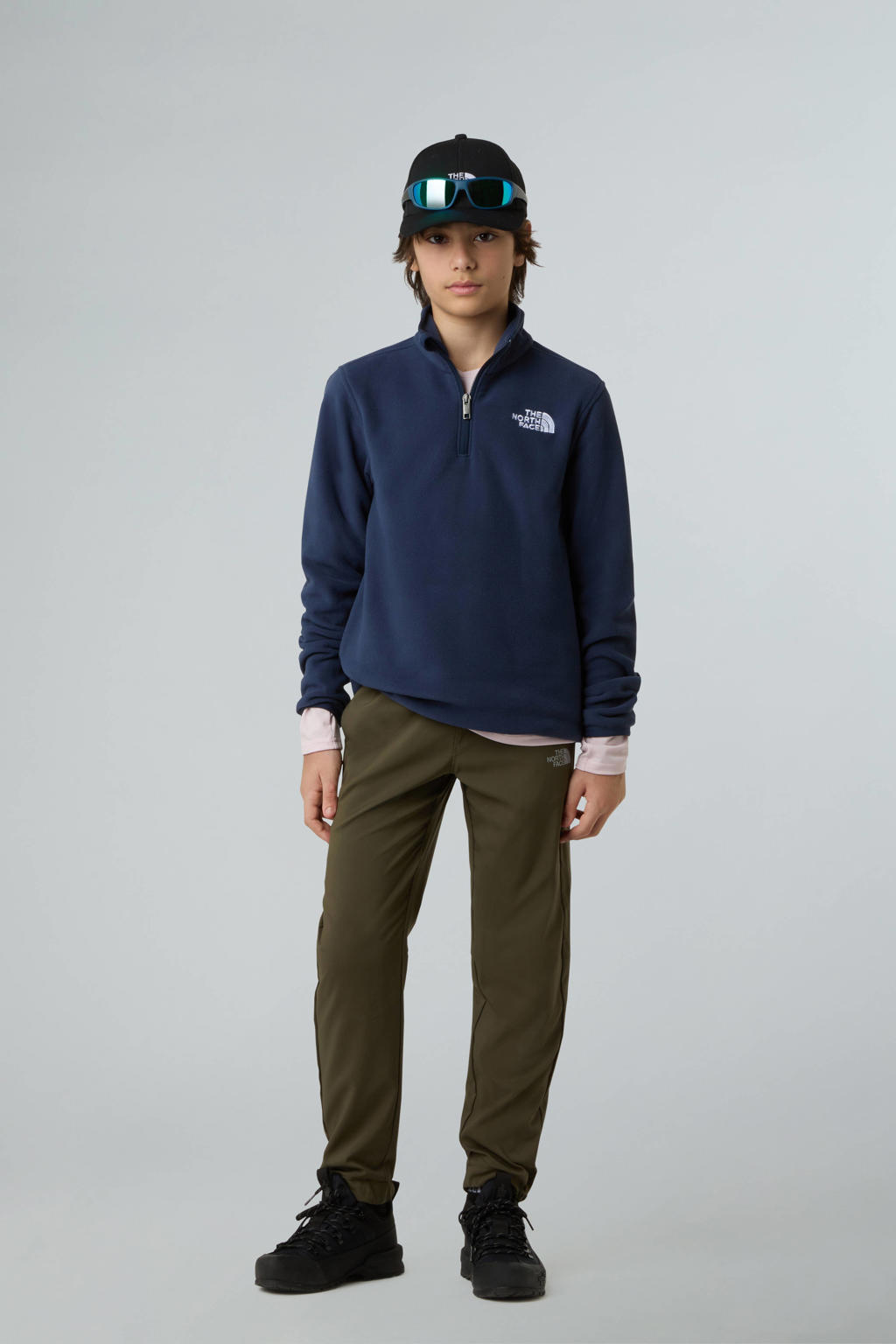 Donkerblauwe jongens en meisjes The North Face fleece sweater Glacier donkeblauw met effen, lange mouwen, opstaande kraag en halve rits