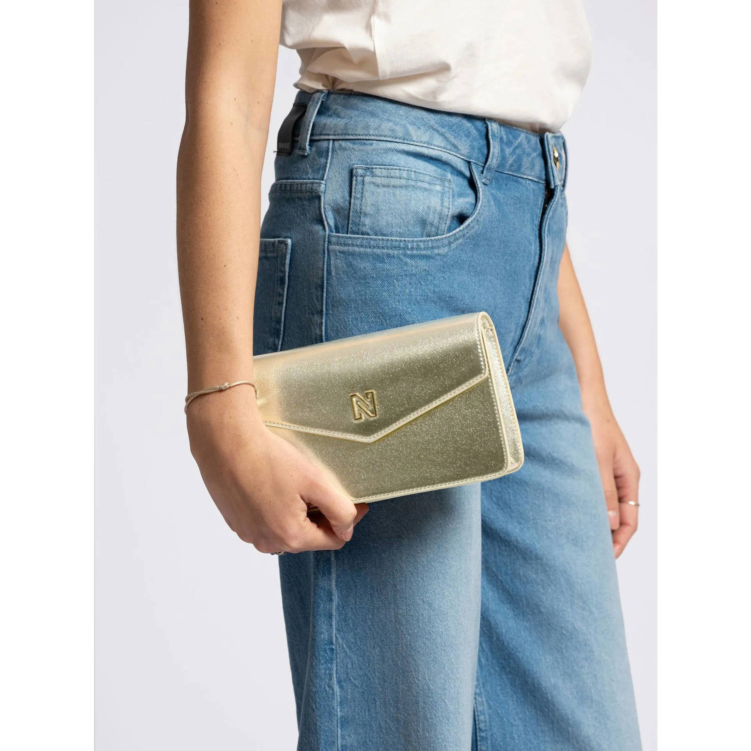 NIKKIE crossbody tas Daxing goudkleurig