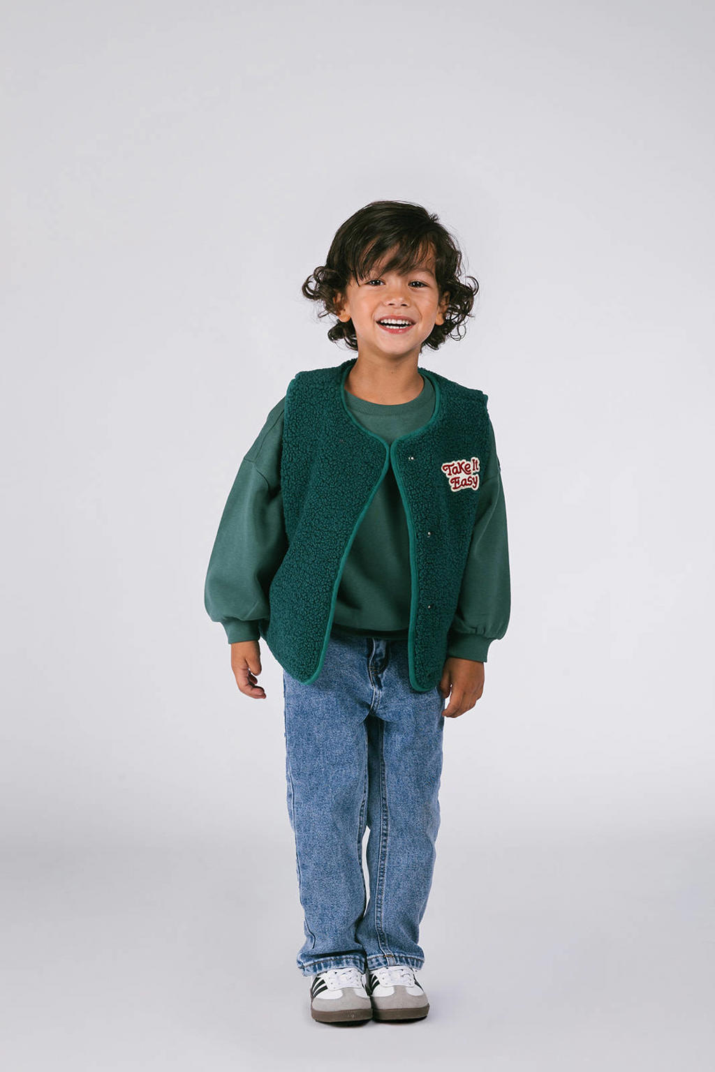 Groene jongens en meisjes The New Chapter teddy bodywarmer met tekst print, ronde hals en blinde knoopsluiting