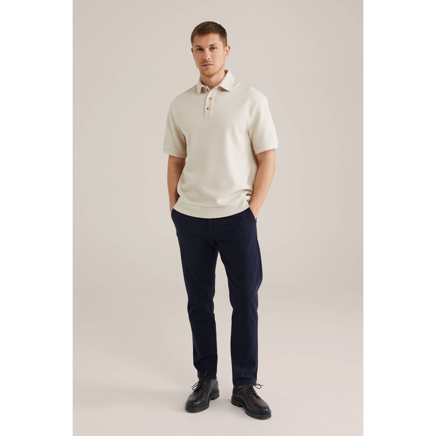 WE Fashion loose polo met textuur beige
