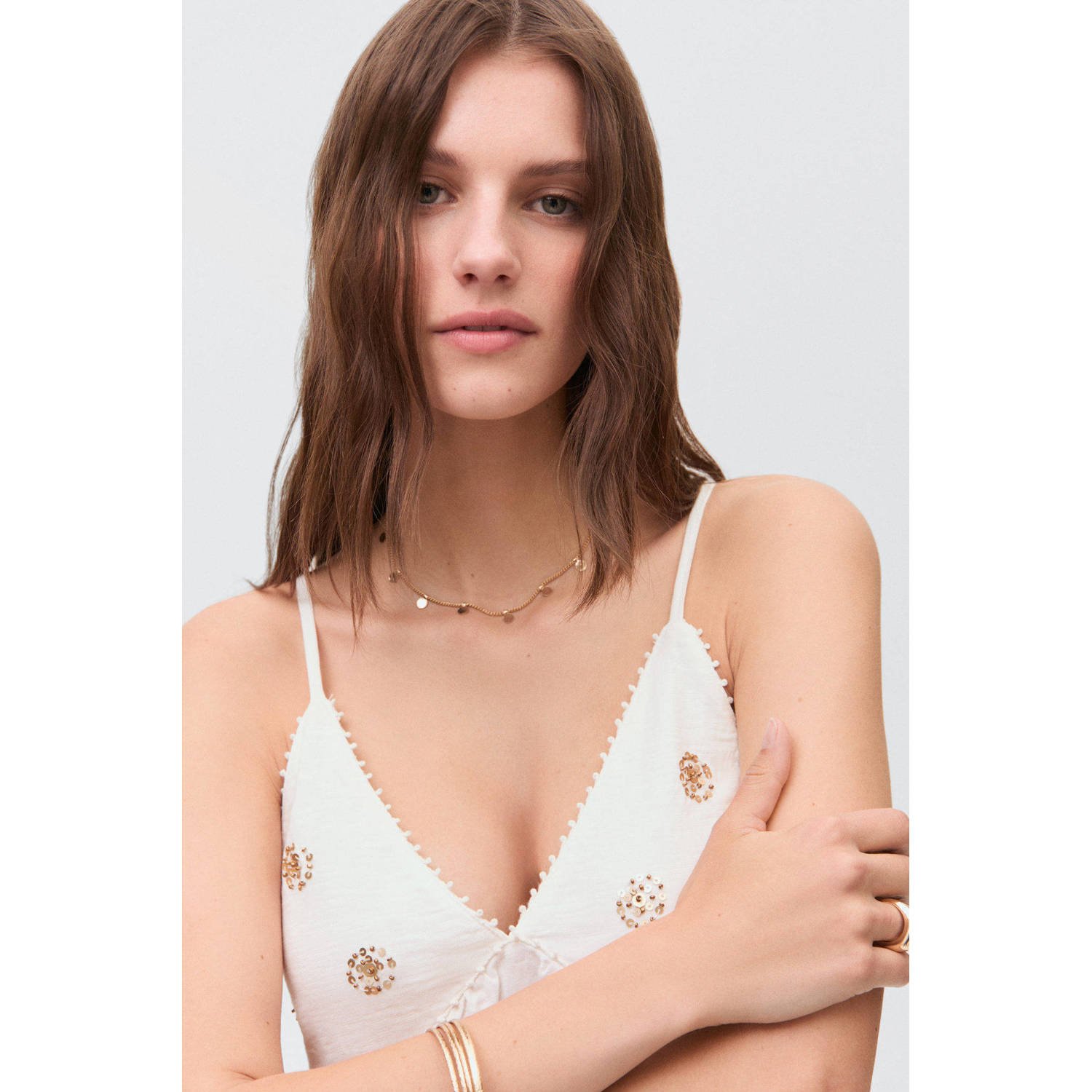 MANGO TEEN mouwloze top ecru met pailletten