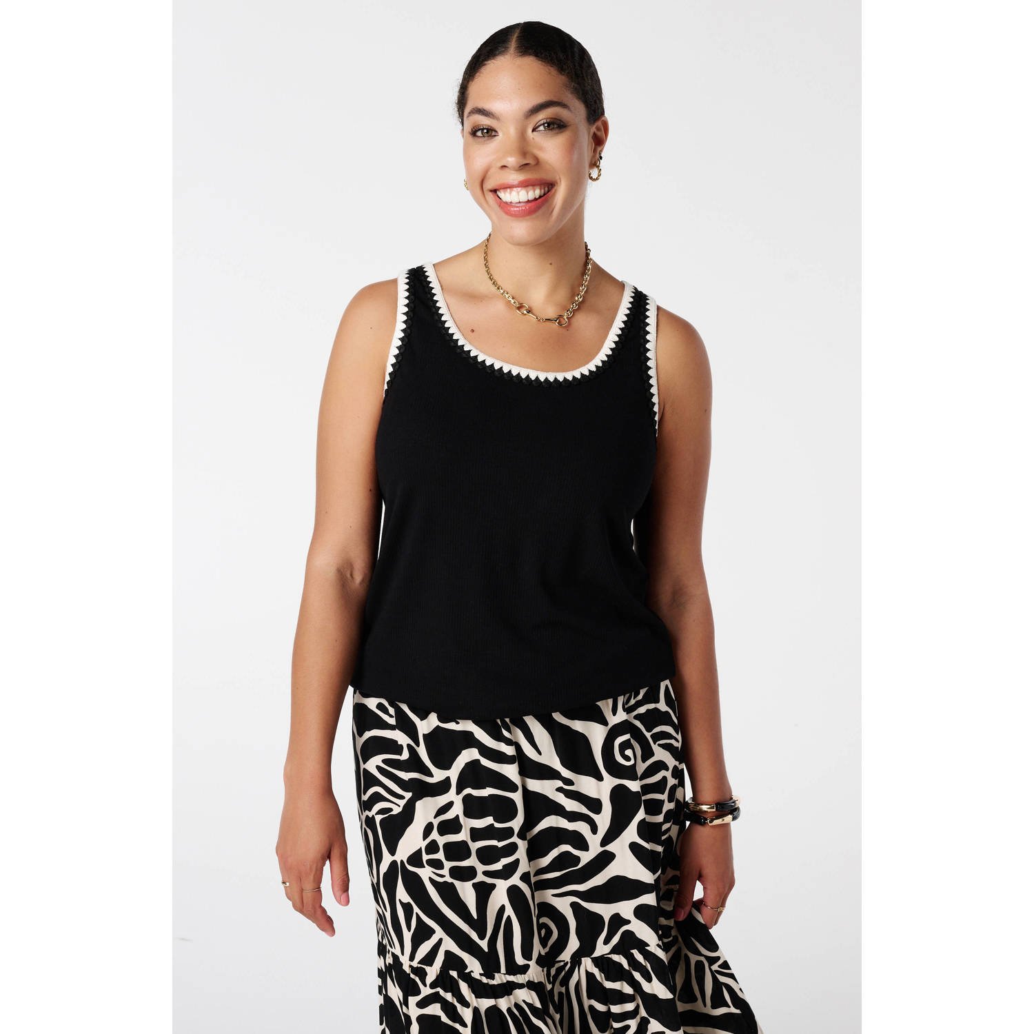 MS Mode mouwloze top zwart rib gebreid
