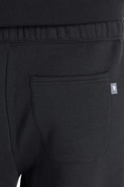 thumbnail: Zwarte dames New Balance joggingbroek van katoen met loose fit, regular waist, elastische tailleband met koord en effen