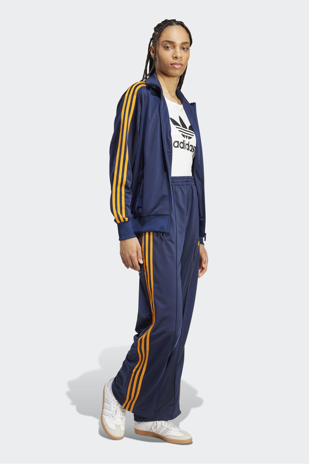 Donkerblauw en oranje dames adidas Originals trainingsbroek Firebird Loose van polyester met regular fit, regular waist en effen