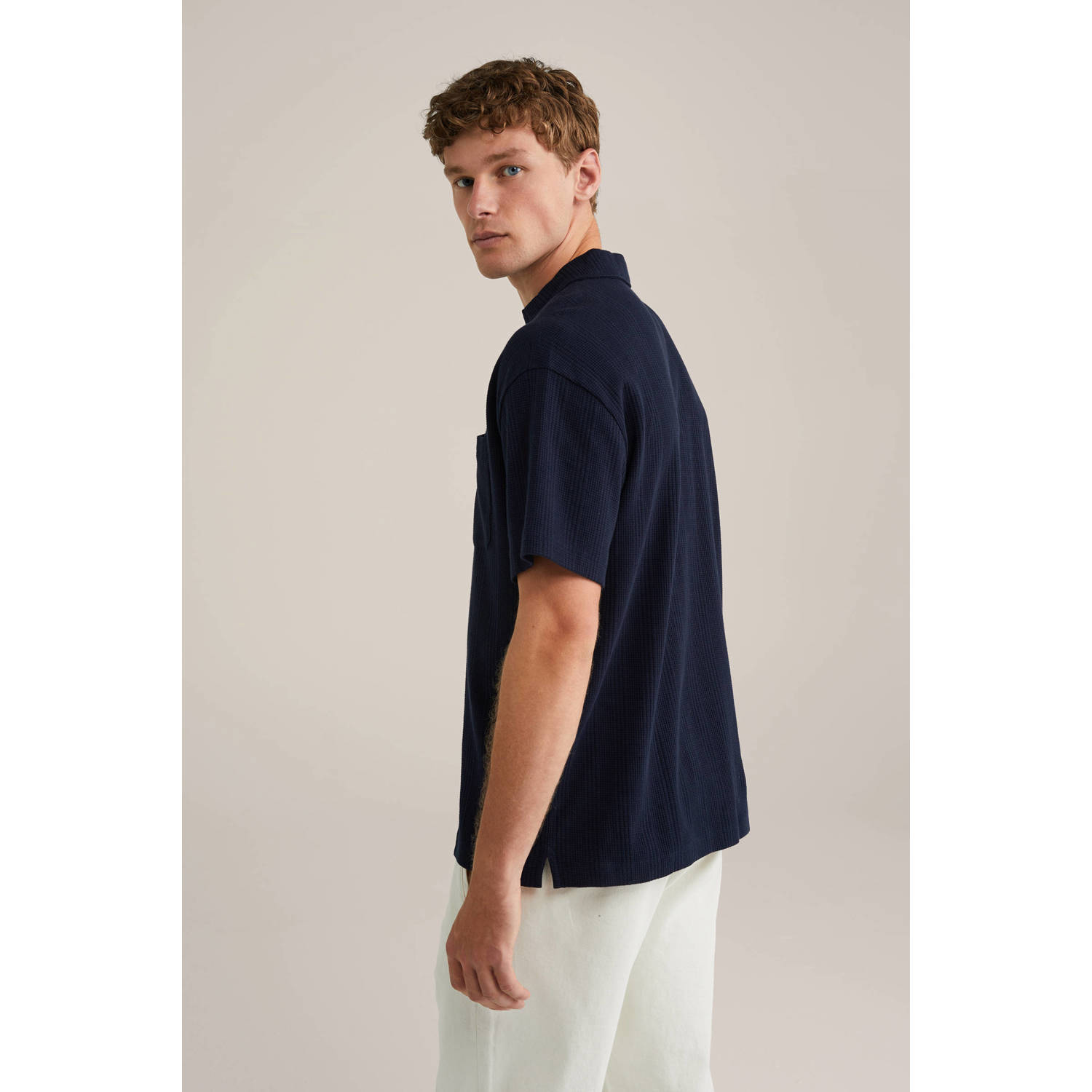 WE Fashion rechtvallend polo met ingebreid patroon donkerblauw