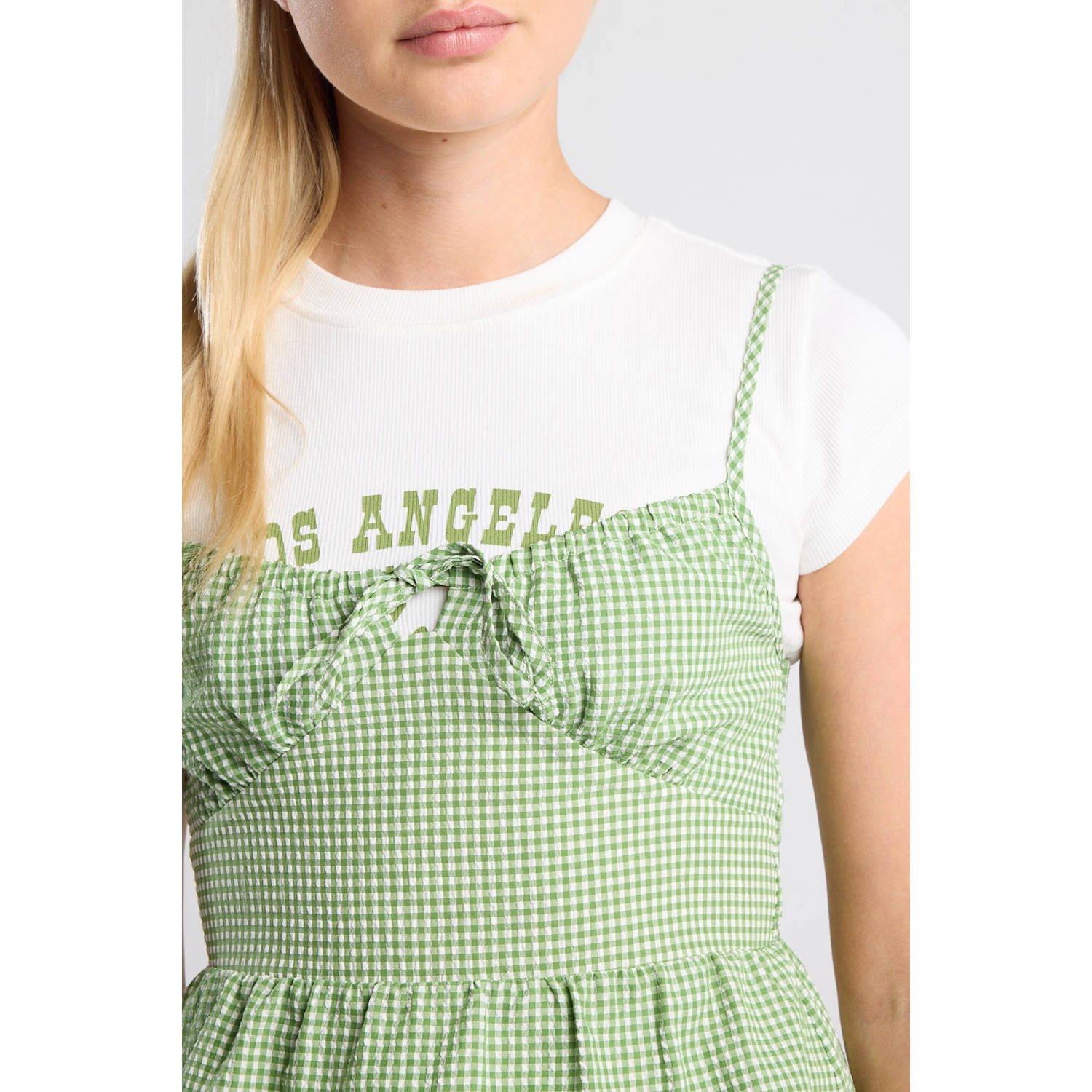 America Today mouwloze top lichtgroen