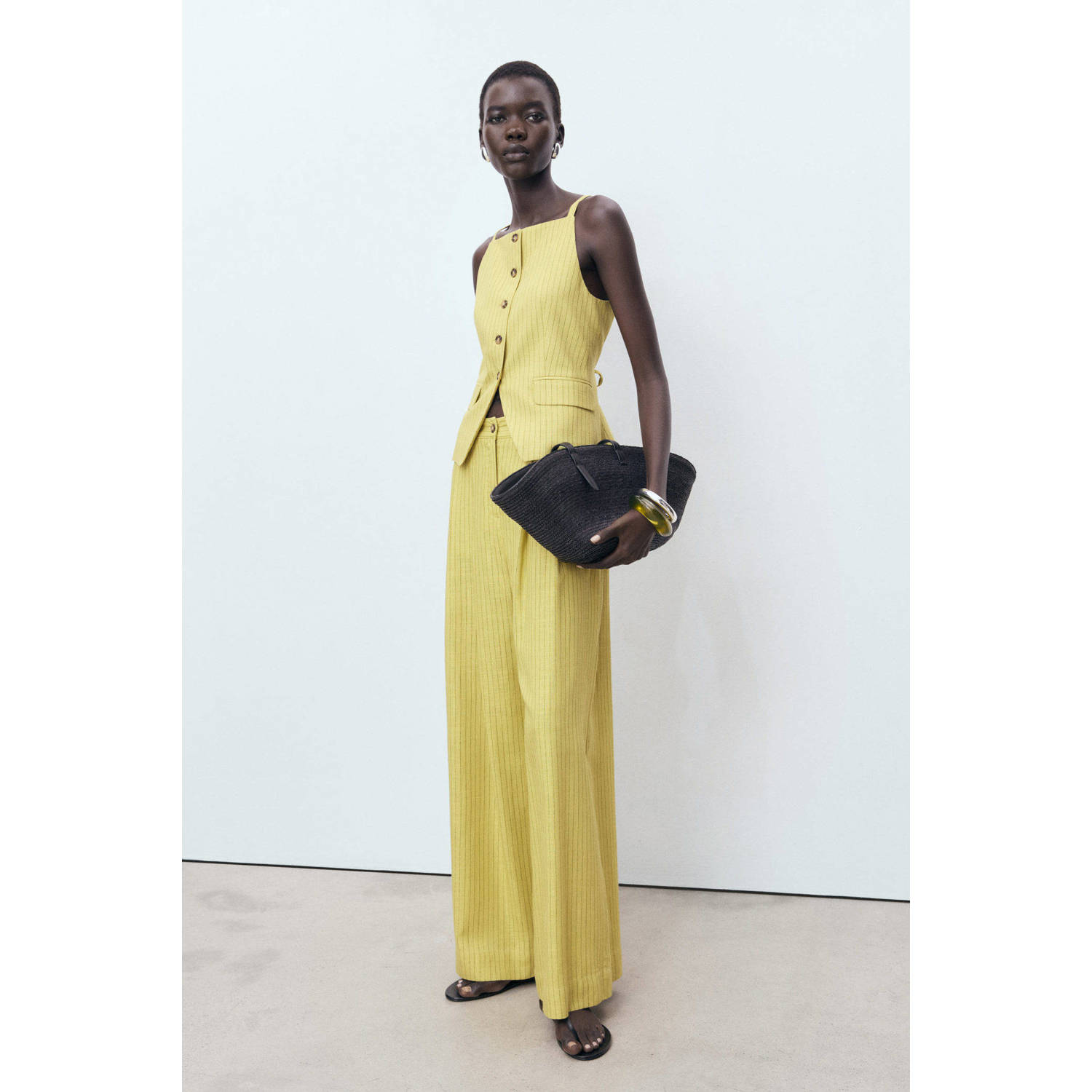 Mango wide leg regular waist broek geel