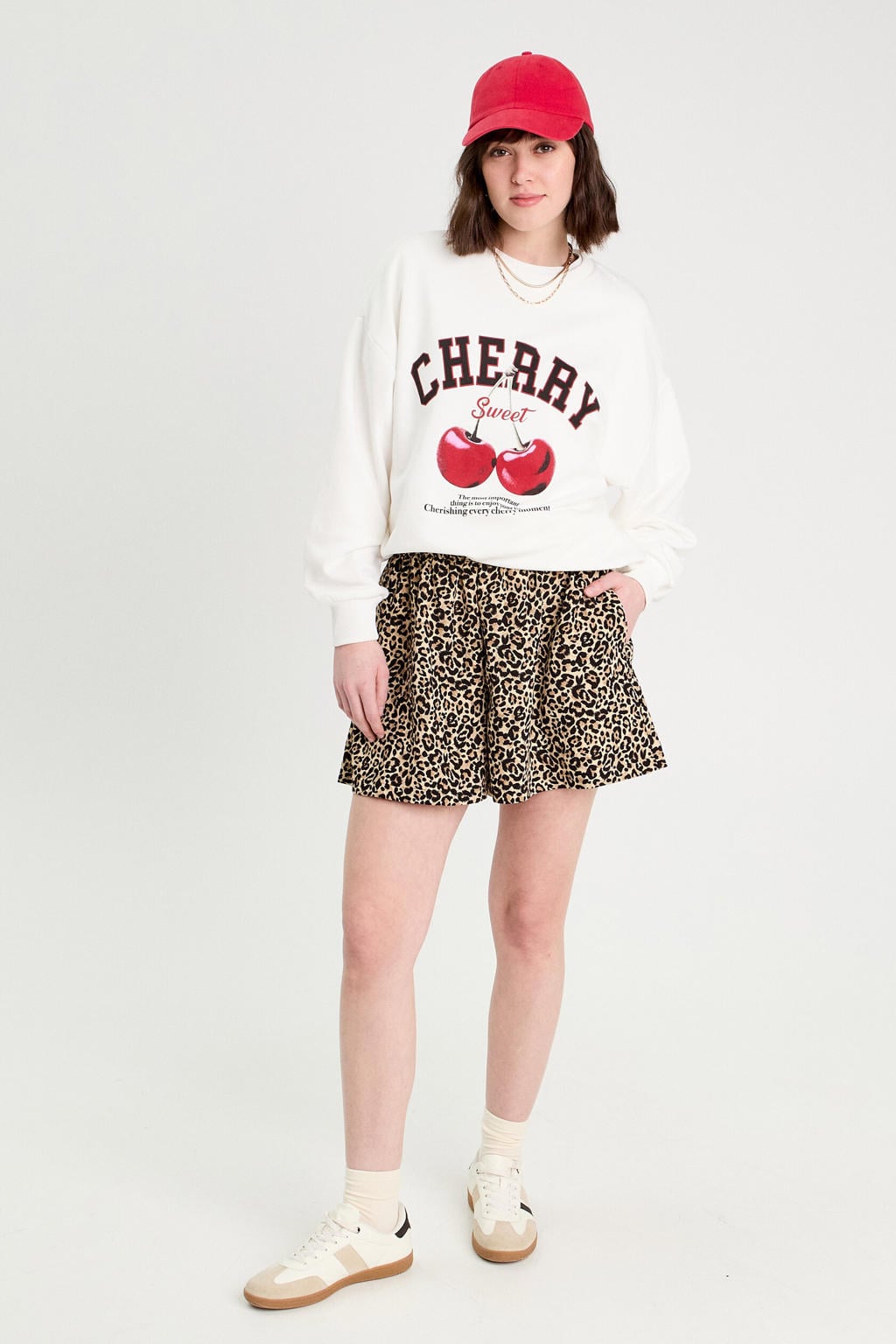 Beige en zwarte dames Cache Cache regular waist casual short van polyester met dierenprint