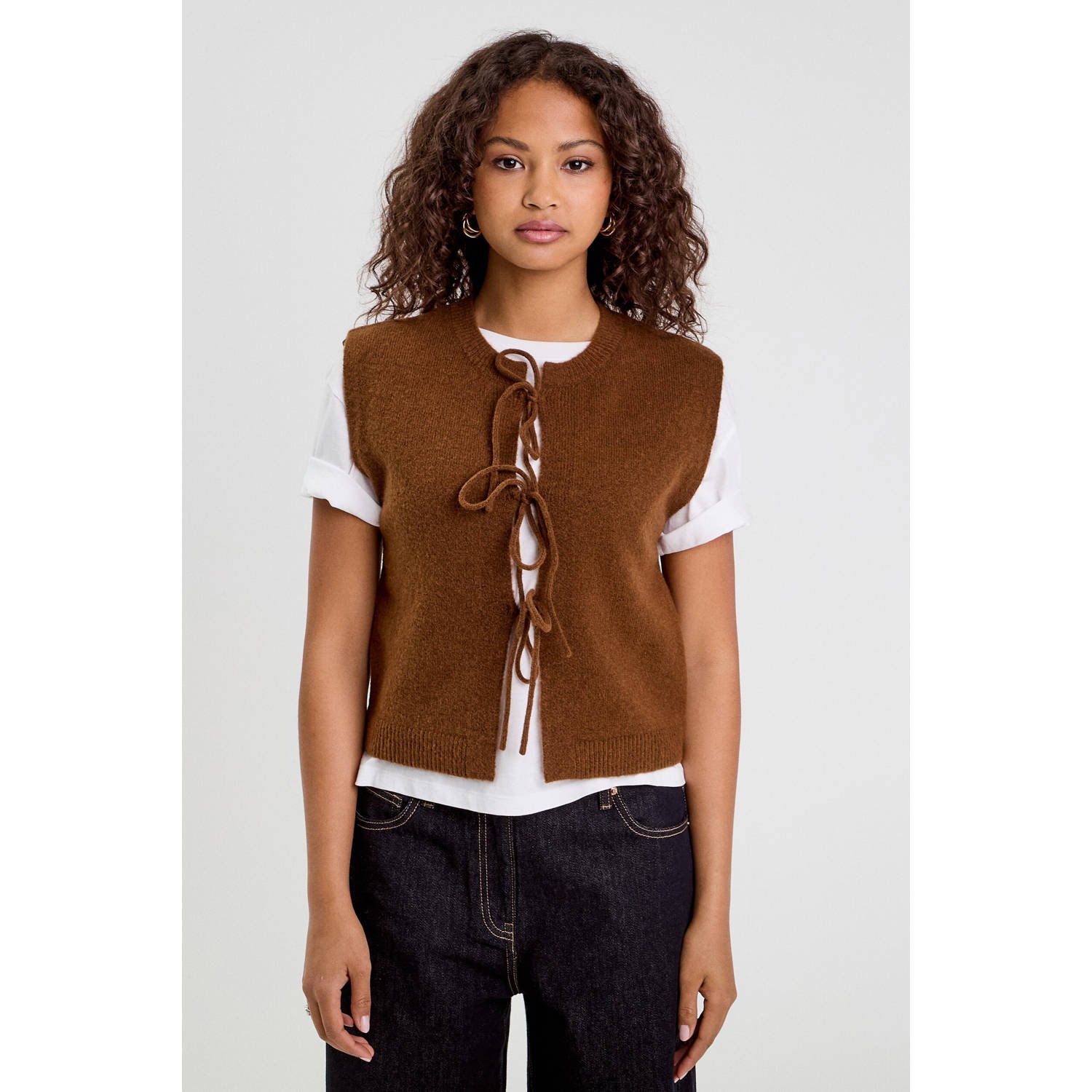 Cache gilet bruin