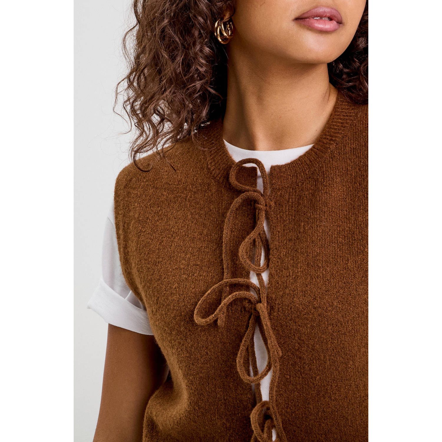 Cache gilet bruin