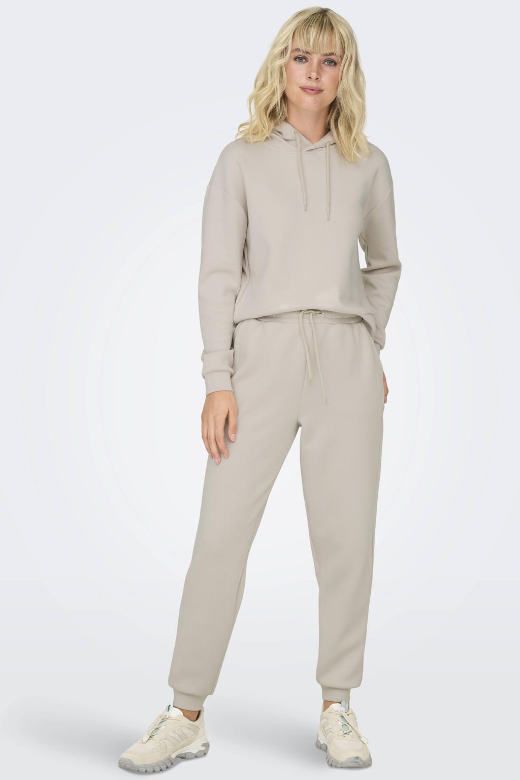 Ecru dames ONLY PLAY sportbroek van polyester met loose fit, regular waist, elastische tailleband met koord en effen