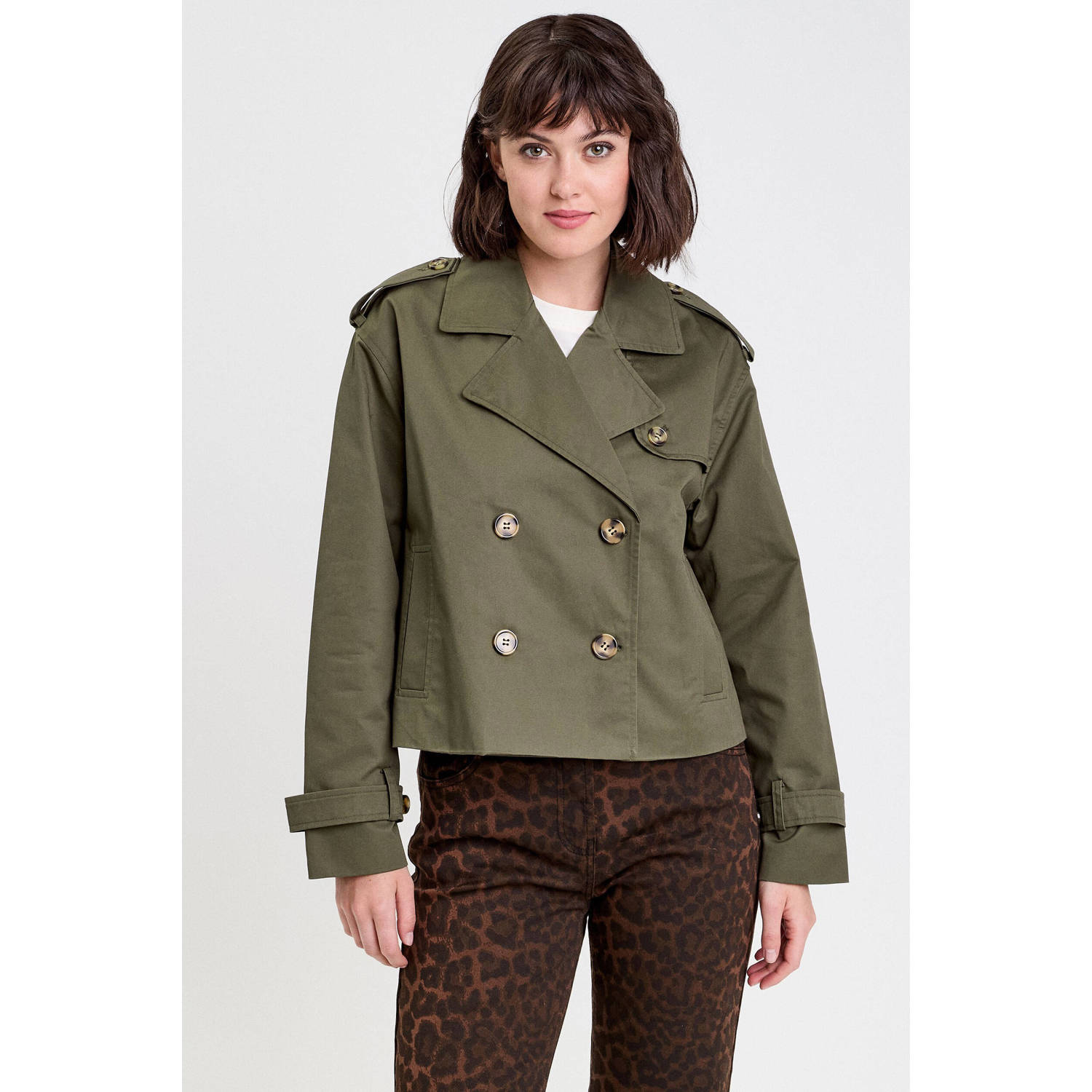 Cache trenchcoat kaki