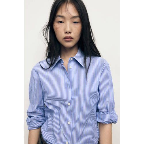 Mango blouse lichtblauw afbeelding
