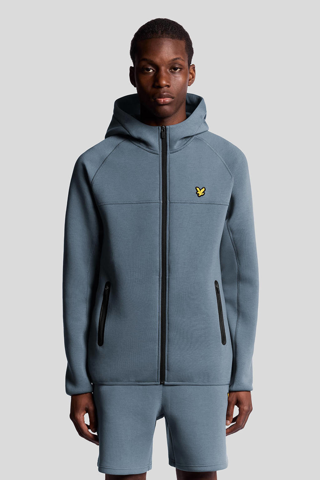 Grijsblauwe heren Lyle & Scott vest blauw van sweat materiaal met effen, lange mouwen, capuchon en ritssluiting