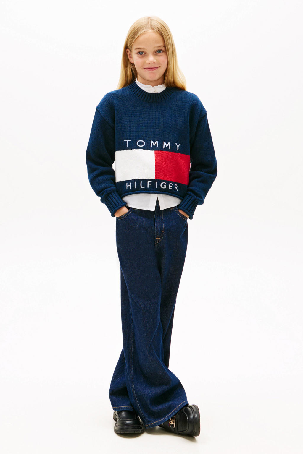 Donkerblauwe meisjes Tommy Hilfiger trui gebreid van sweat materiaal met logo dessin, lange mouwen en ronde hals