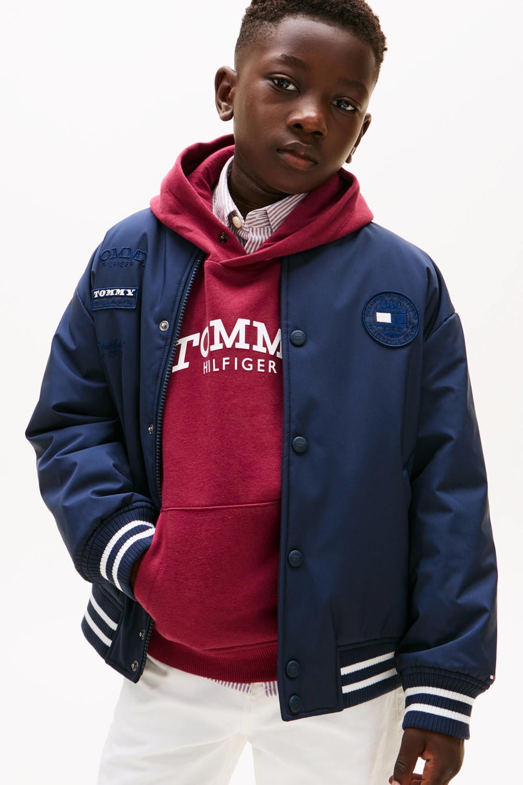 Donkerblauwe jongens Tommy Hilfiger bomberjack lente van polyester met effen, lange mouwen, ronde hals, drukknoopsluiting en elastische boord