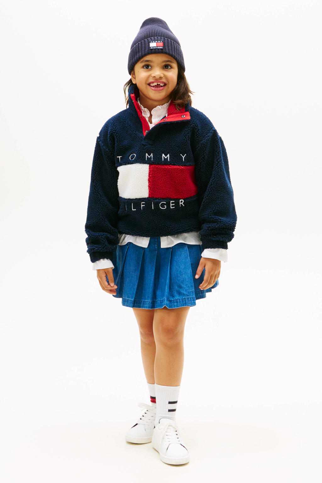 Donkerblauwe jongens en meisjes Tommy Hilfiger teddy fleecetrui met logo dessin, lange mouwen, opstaande kraag en elastische boord
