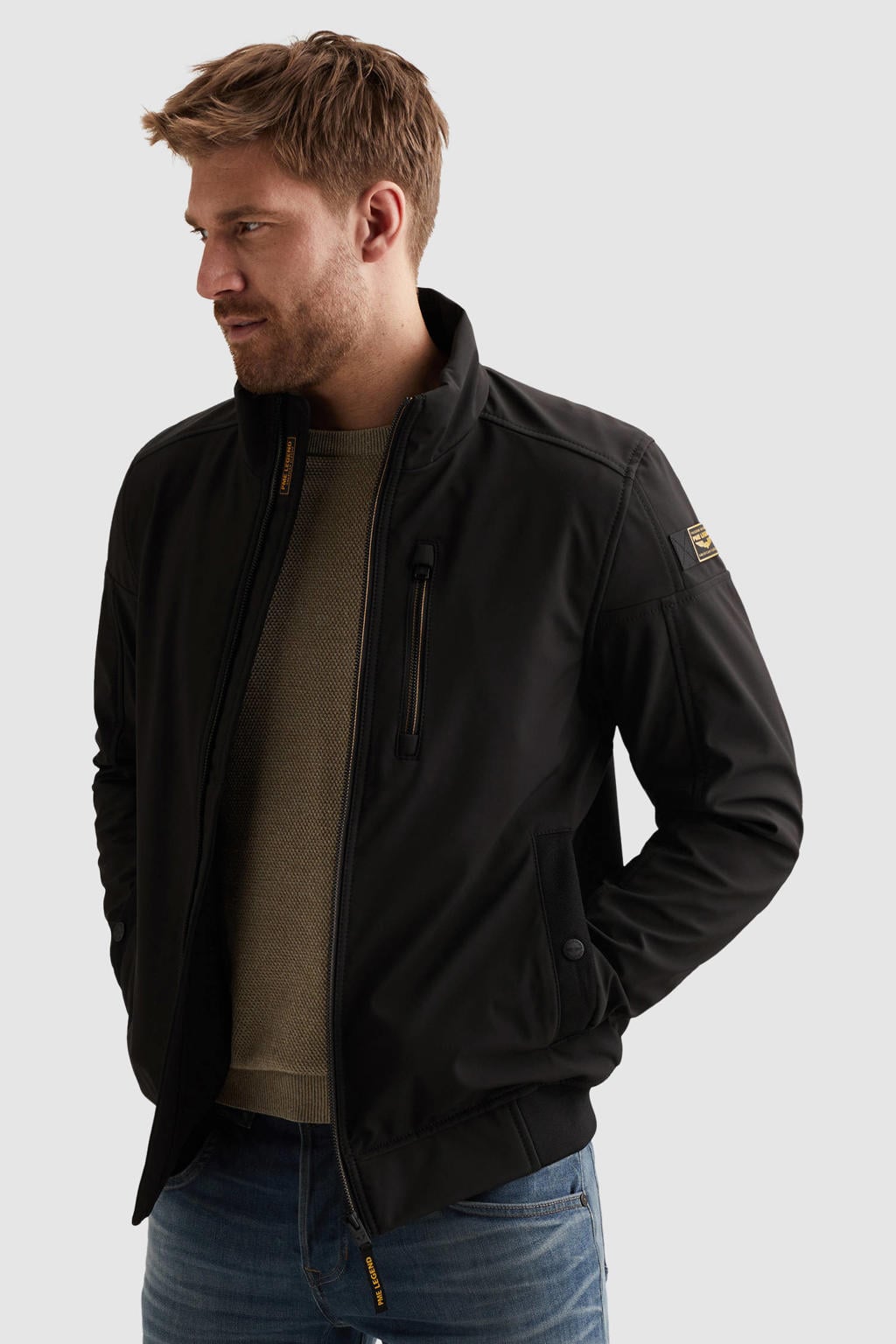 Zwarte heren PME Legend softshell van polyester met effen, lange mouwen, opstaande kraag, rits met windvanger en elastische boord