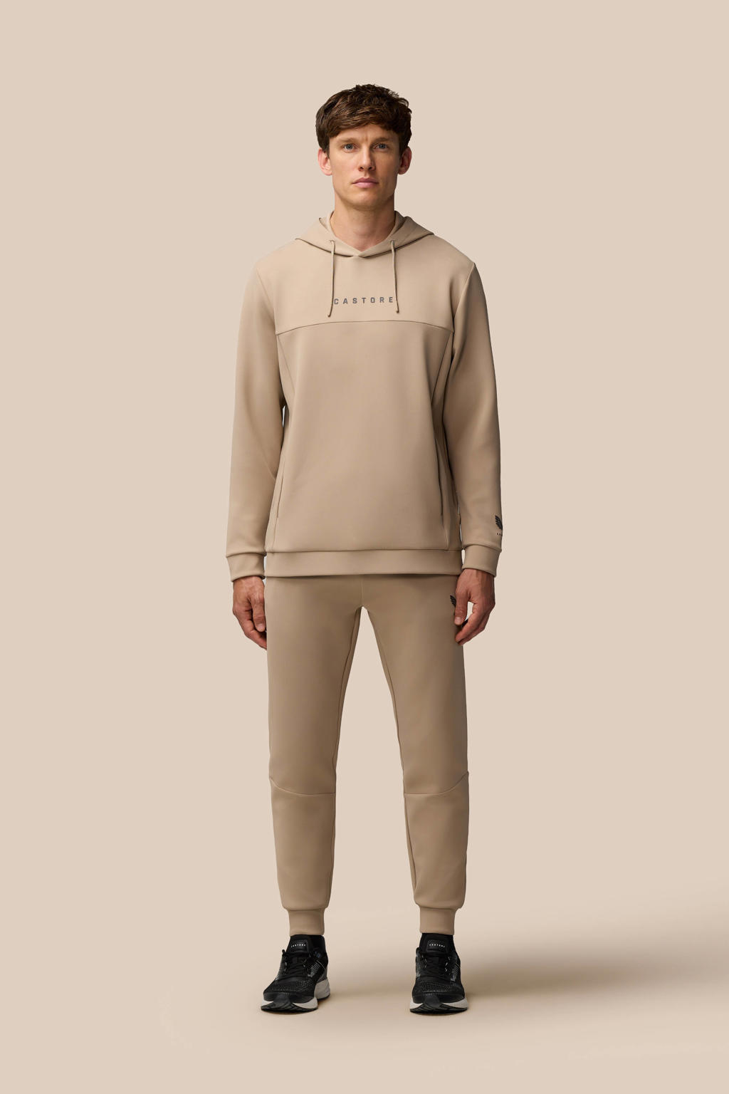 Beige heren Castore sporthoodie Flex van polyester met lange mouwen en capuchon